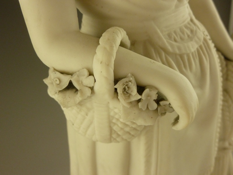 Antique Porcelain Statue