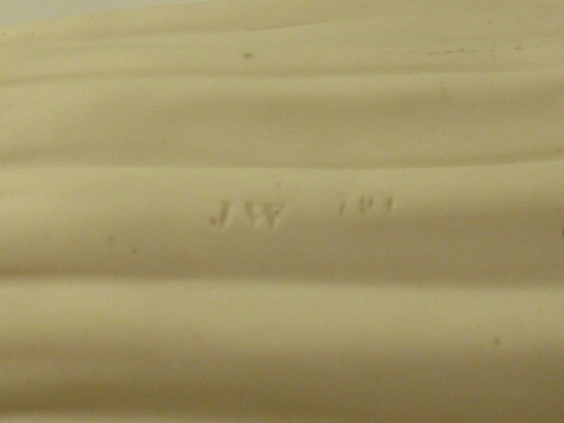 Antique Porcelain Statue