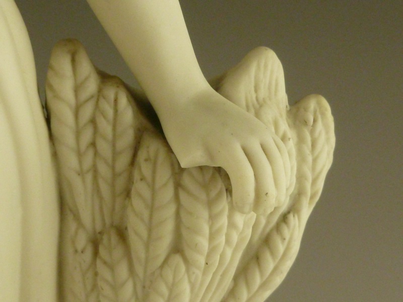 Antique Porcelain Statue