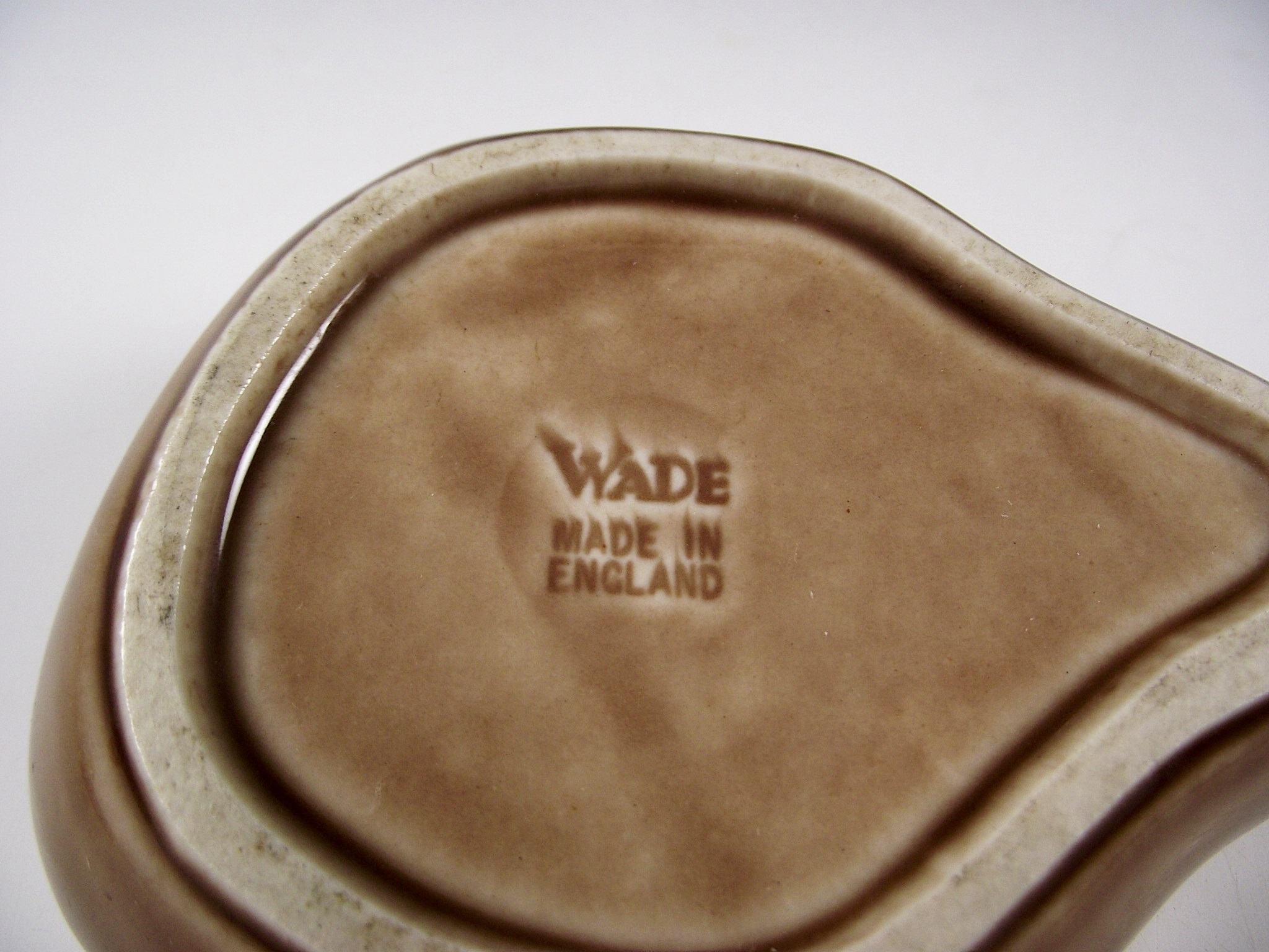 Group of Wade porcelain pin trays.