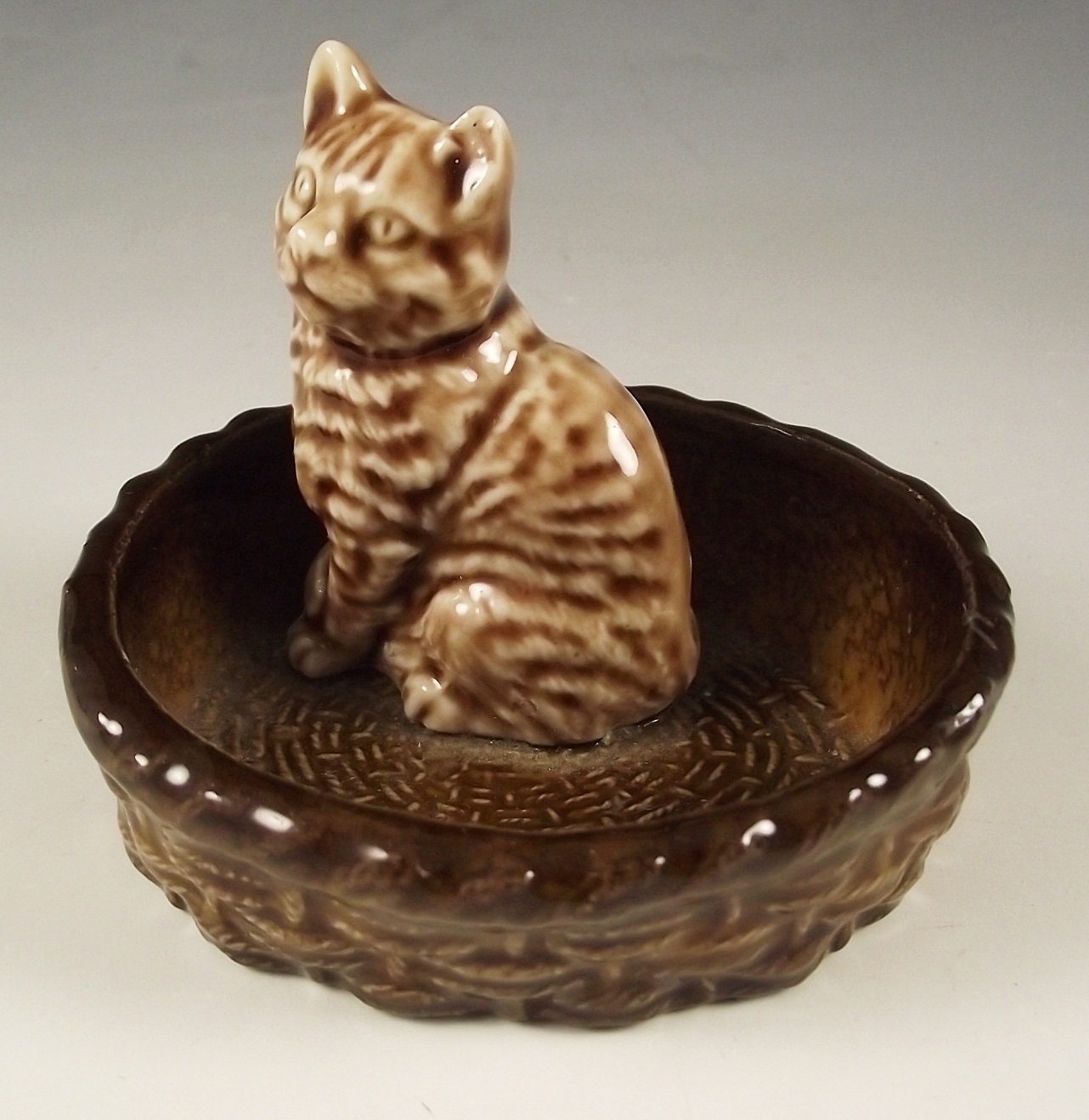 Group of Wade porcelain pin trays.