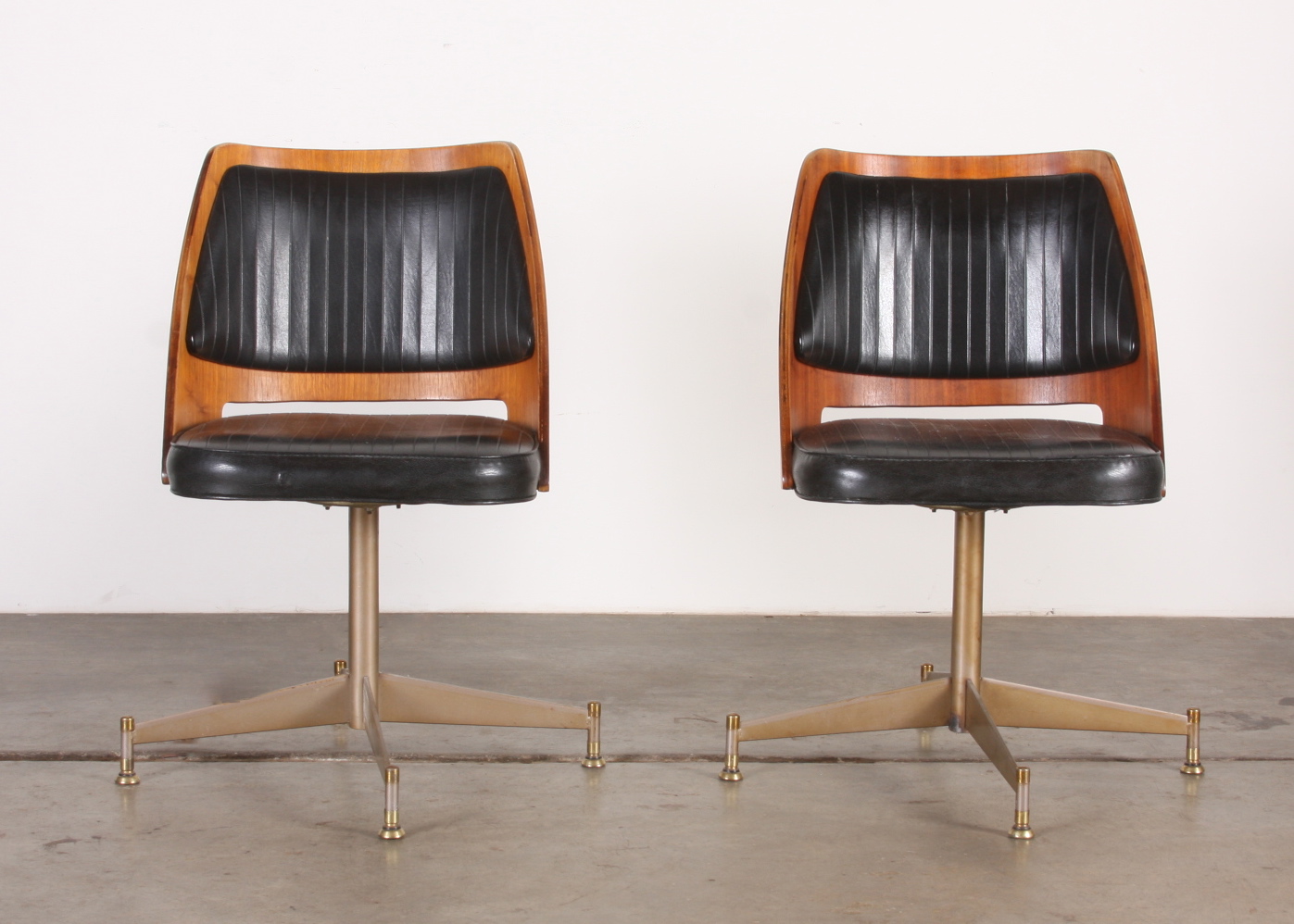 Pair of B. Brody Molded Wood Swivel Chairs