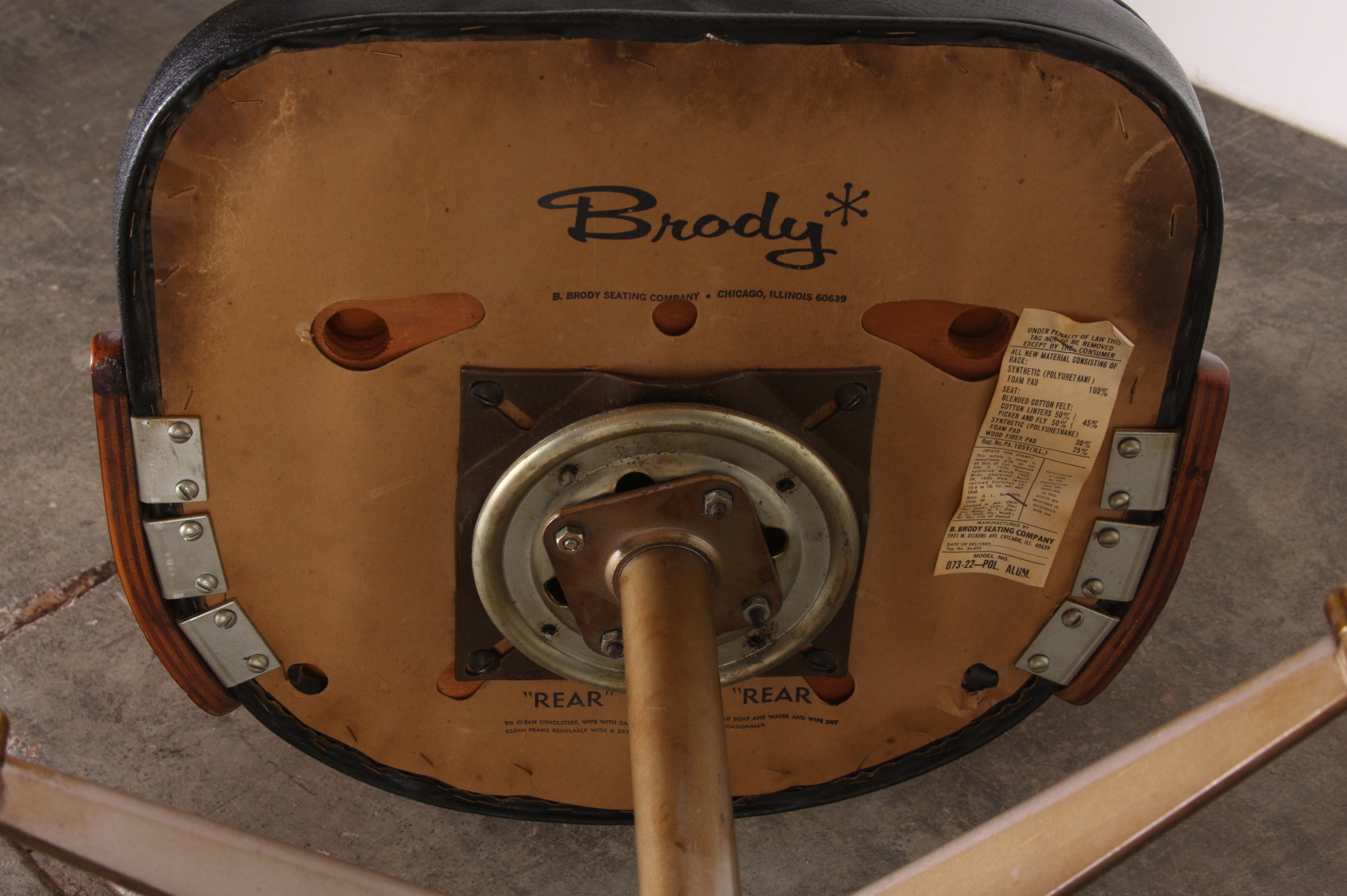 Pair of B. Brody Molded Wood Swivel Chairs