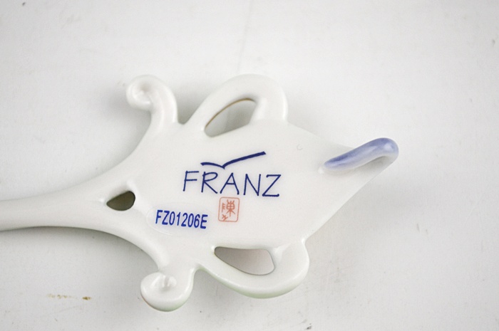 Franz China Signed Luminescence Peacock Cup & Saucer with Spoon