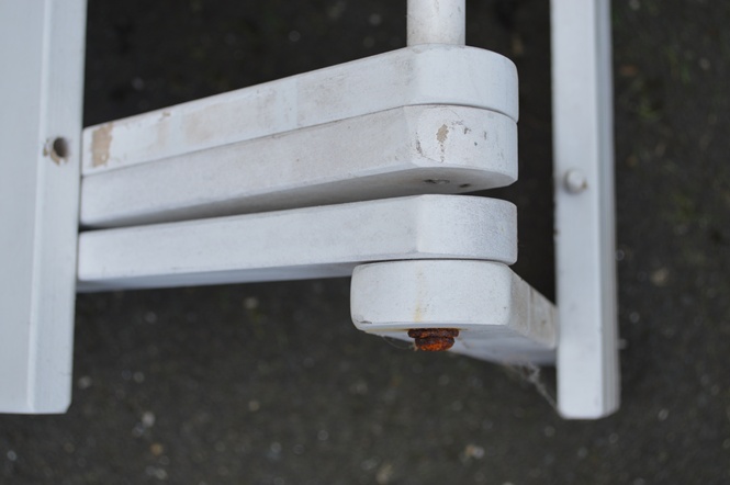 Two White Slatted Wooden Fold Out Side Tables