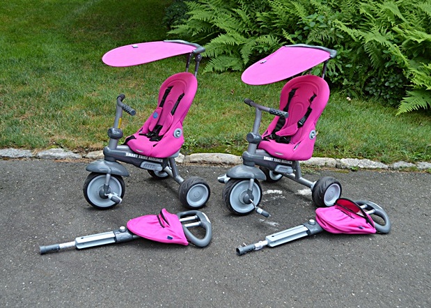Two Bright Pink SmartTriker Toddler Tricycles