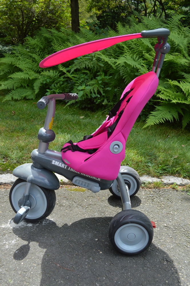 Two Bright Pink SmartTriker Toddler Tricycles