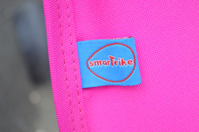 Two Bright Pink SmartTriker Toddler Tricycles