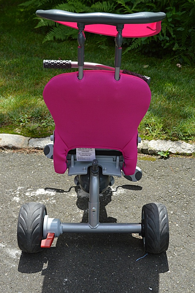 Two Bright Pink SmartTriker Toddler Tricycles