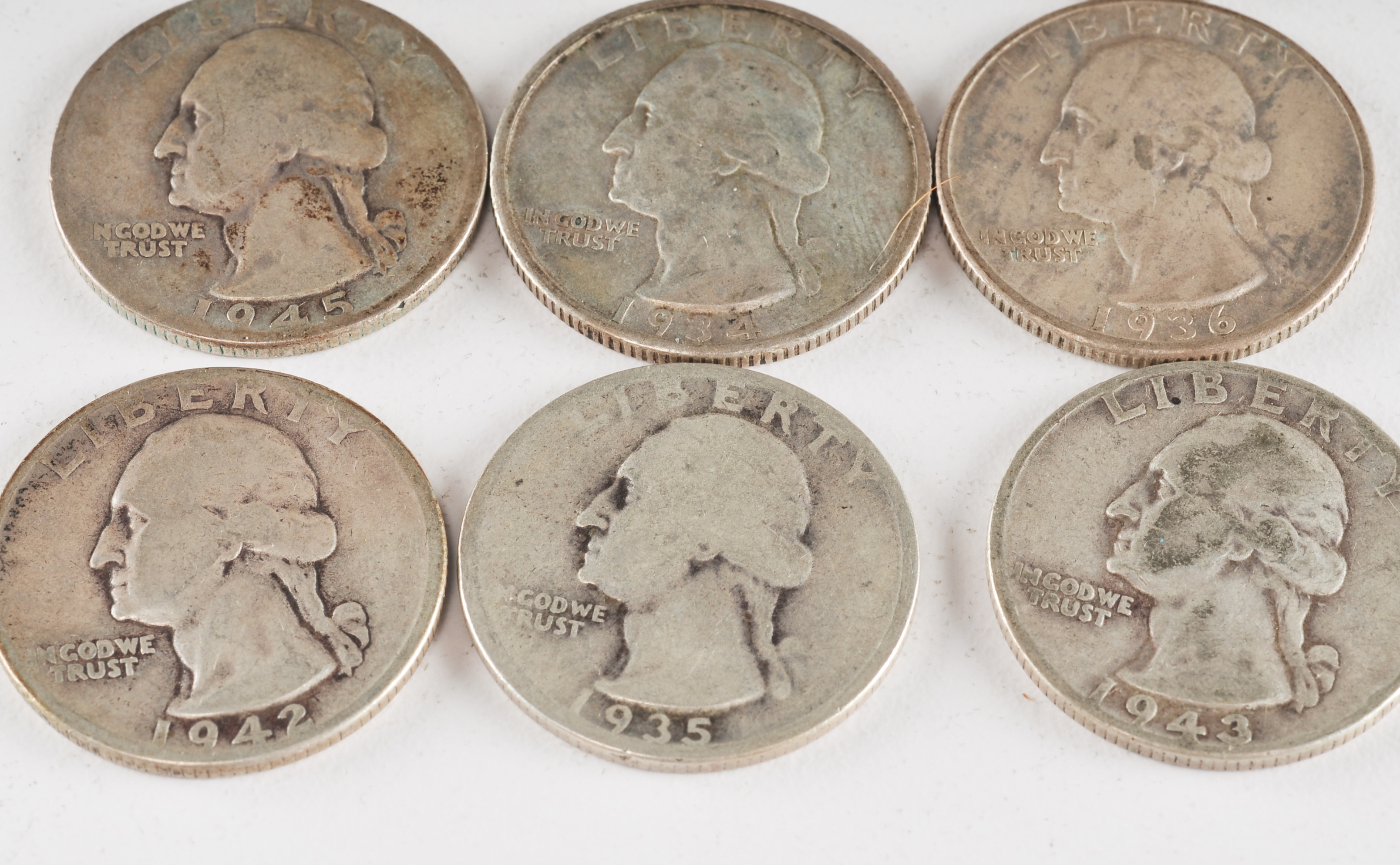 Group of (10) George Washington silver quarters including the following: 1934, 1935, 1936, 1941, 1942, 1943, 1943 D, 1944, 1944 S, and 1945