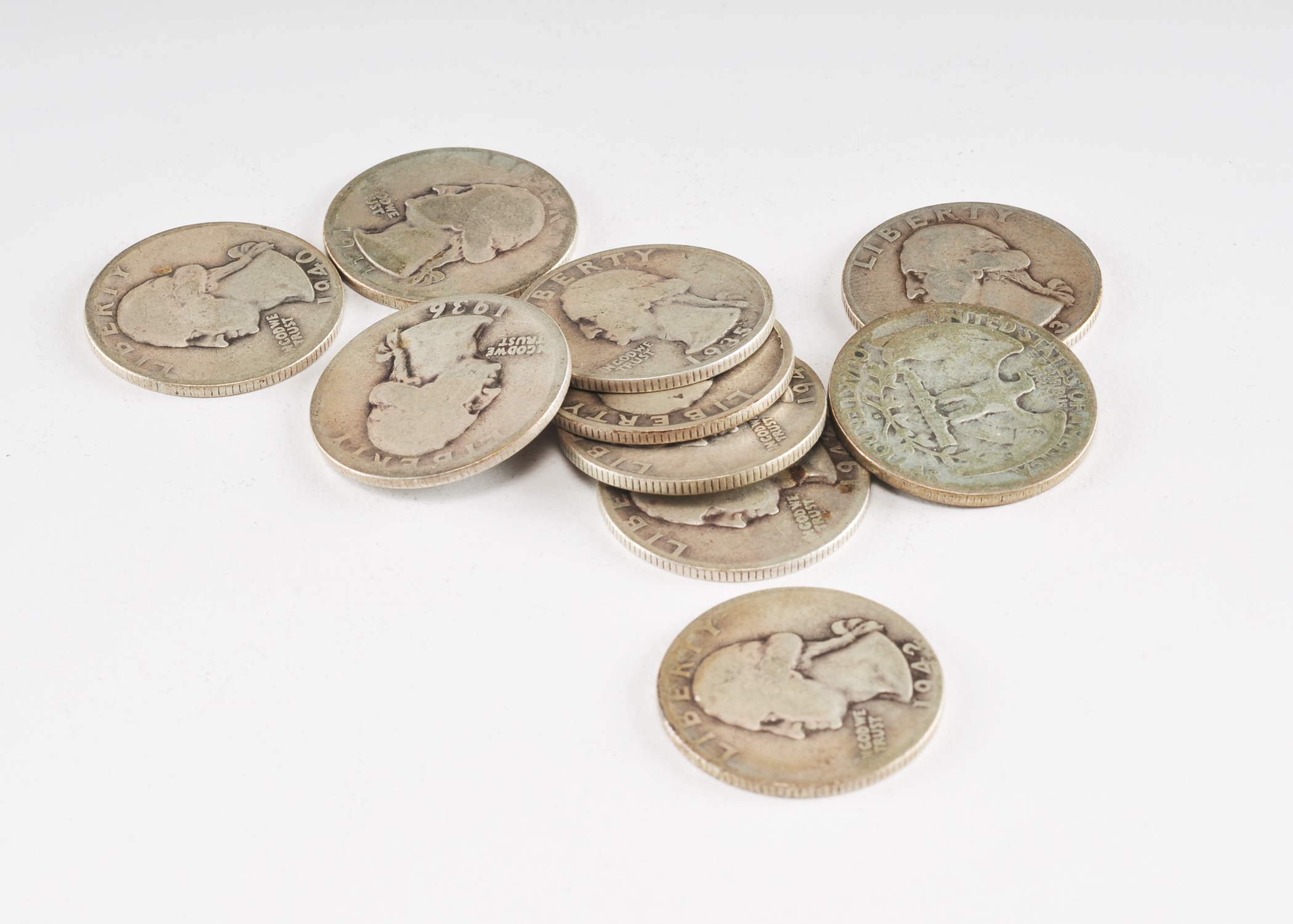 Group of (10) George Washington silver quarters including the following: 1934, 1935, 1936, 1940, 1941, 1941 S, 1942, 1942 D, 1942 S, and 1943