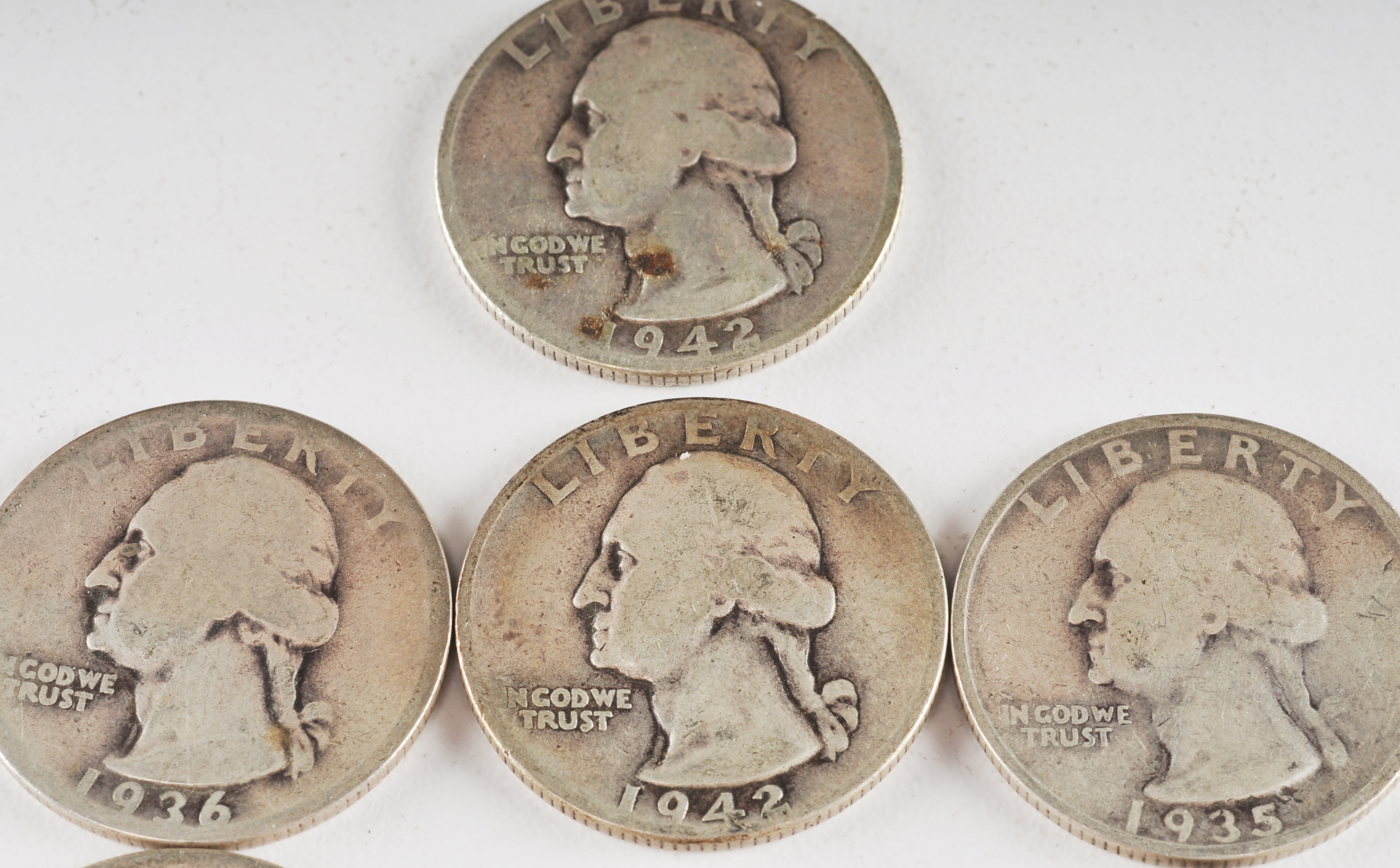 Group of (10) George Washington silver quarters including the following: 1934, 1935, 1936, 1940, 1941, 1941 S, 1942, 1942 D, 1942 S, and 1943