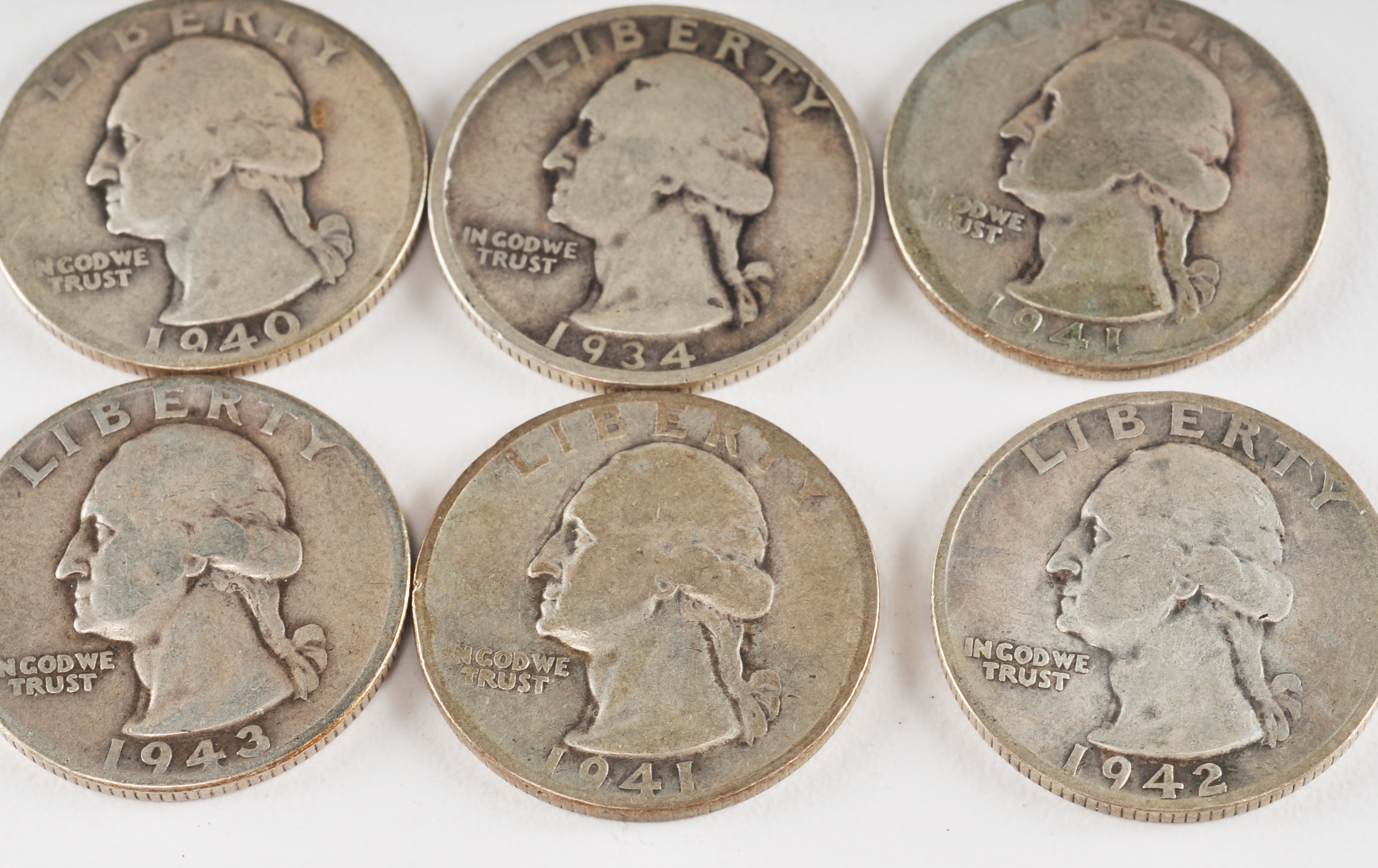Group of (10) George Washington silver quarters including the following: 1934, 1935, 1936, 1940, 1941, 1941 S, 1942, 1942 D, 1942 S, and 1943