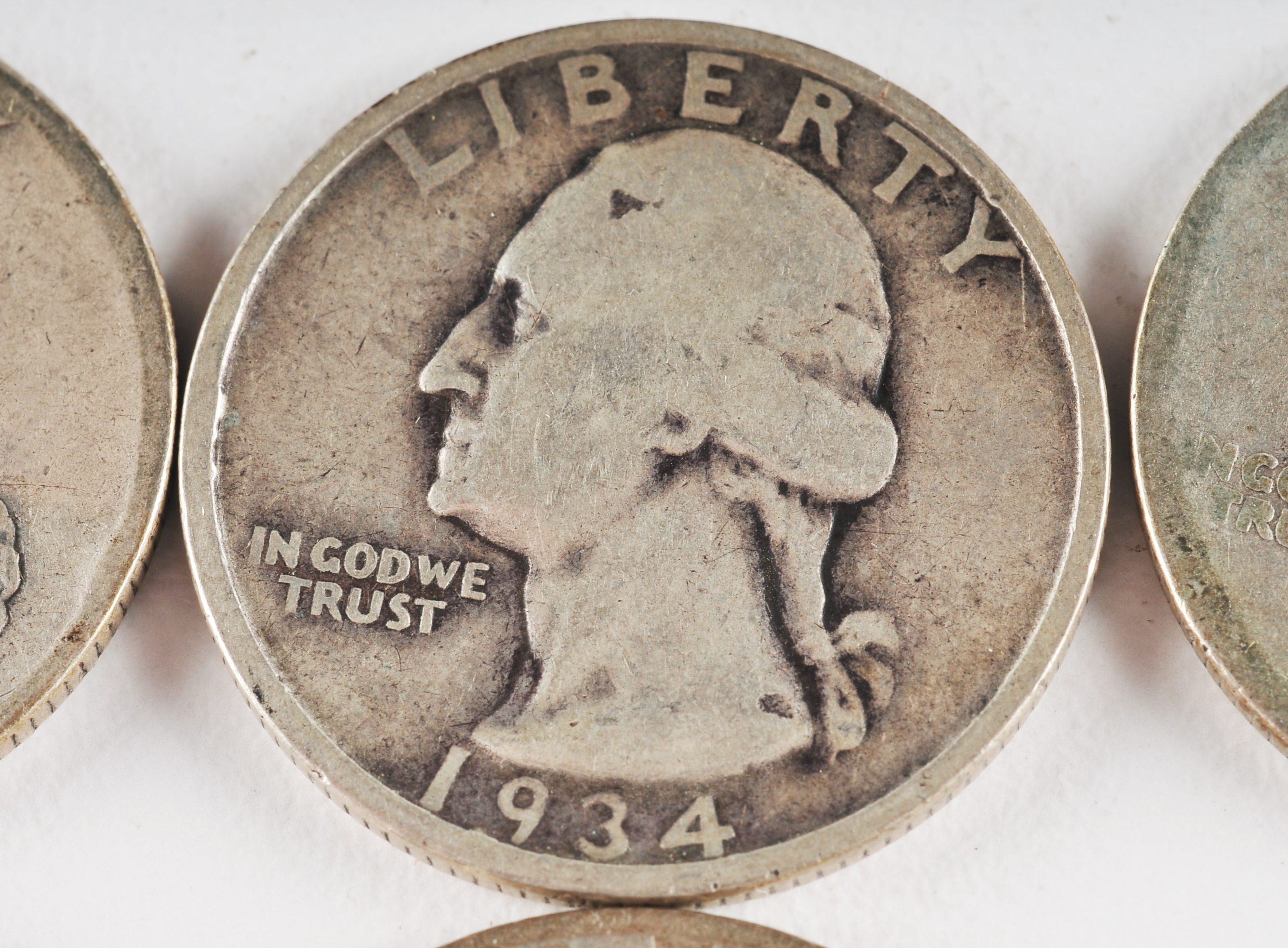 Group of (10) George Washington silver quarters including the following: 1934, 1935, 1936, 1940, 1941, 1941 S, 1942, 1942 D, 1942 S, and 1943