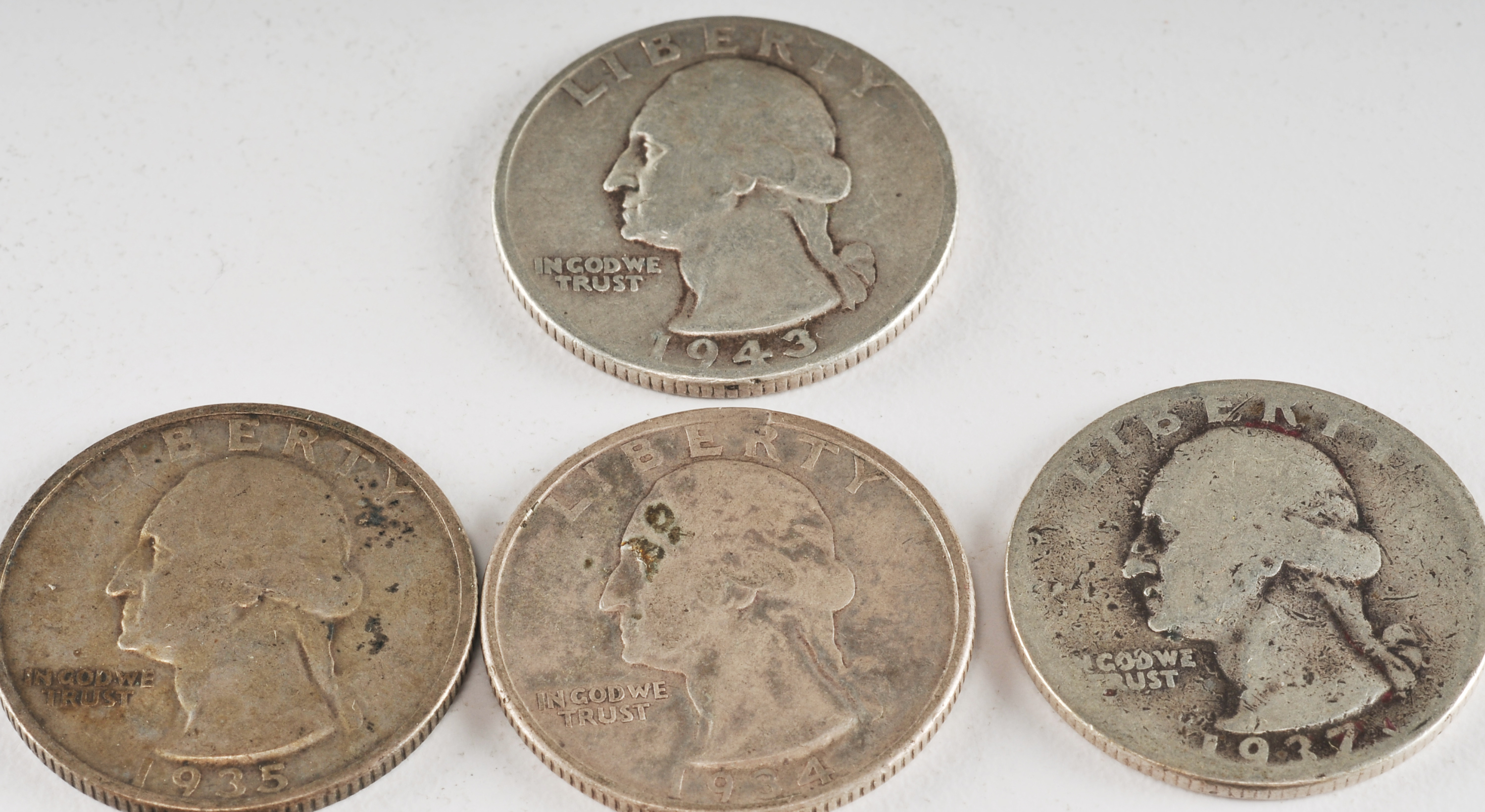 Group of (10) George Washington silver quarters including the following: 1934, 1934 D, 1935, 1936, 1937 D, 1940, 1941, 1942, and 1943