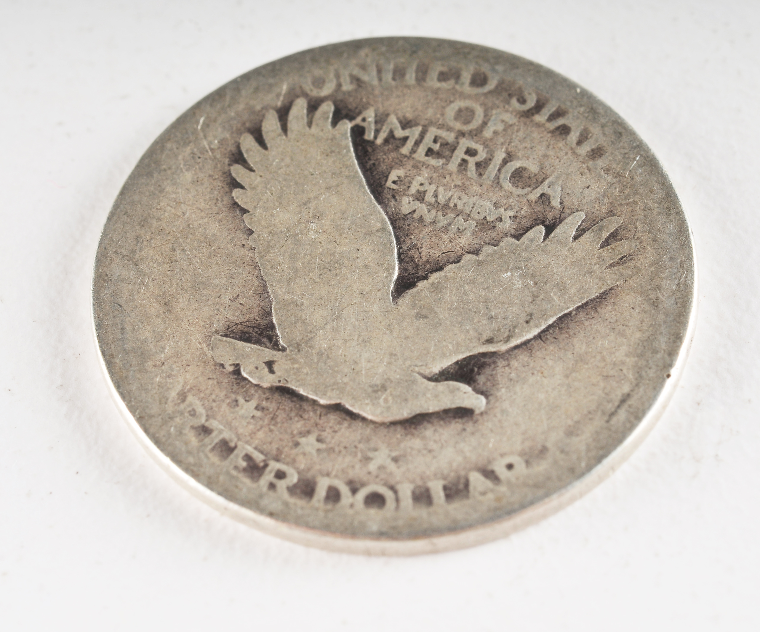 Group of (5) silver Standing Liberty quarters with unreadable dates