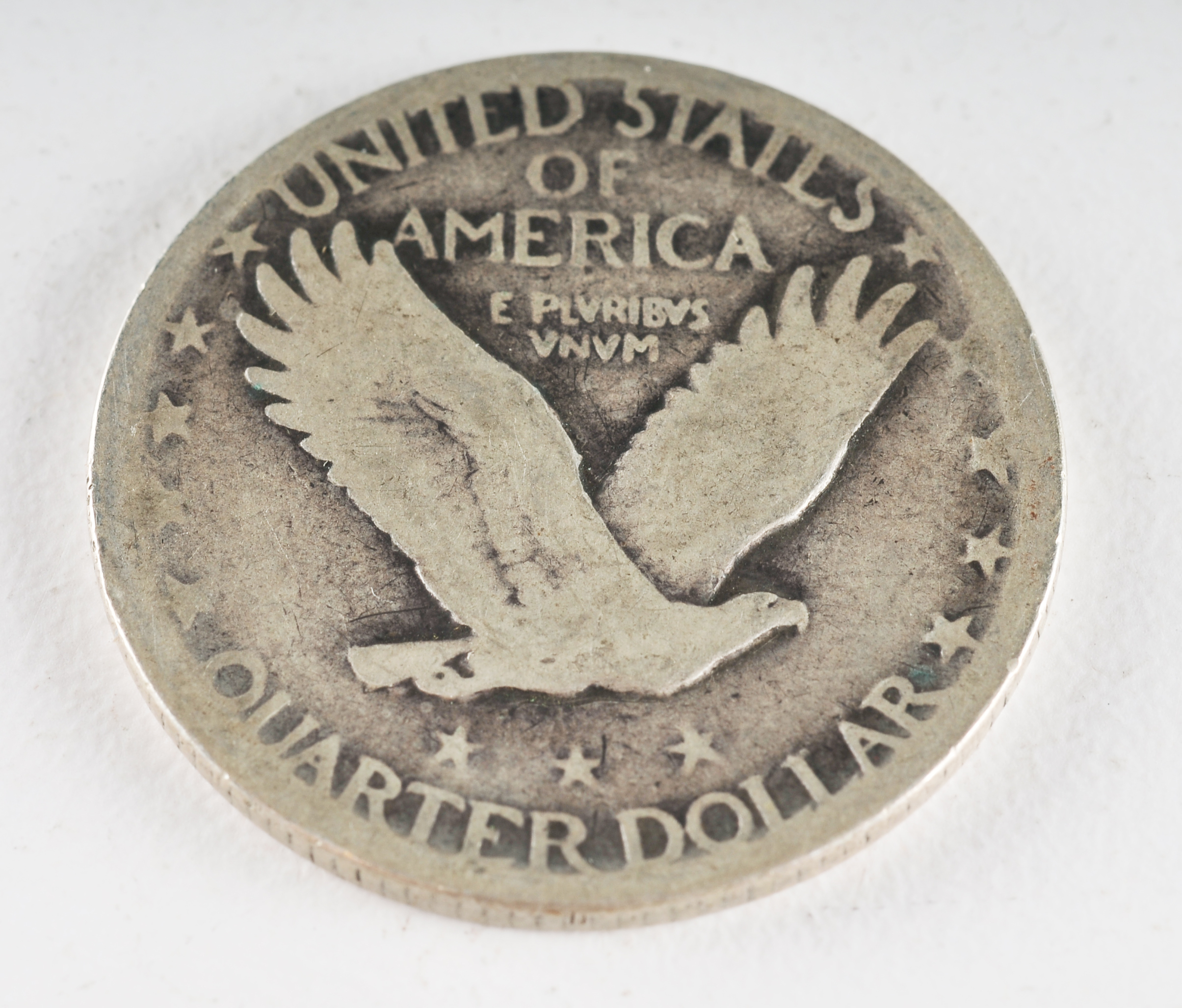 Group of (5) silver Standing Liberty quarters with unreadable dates