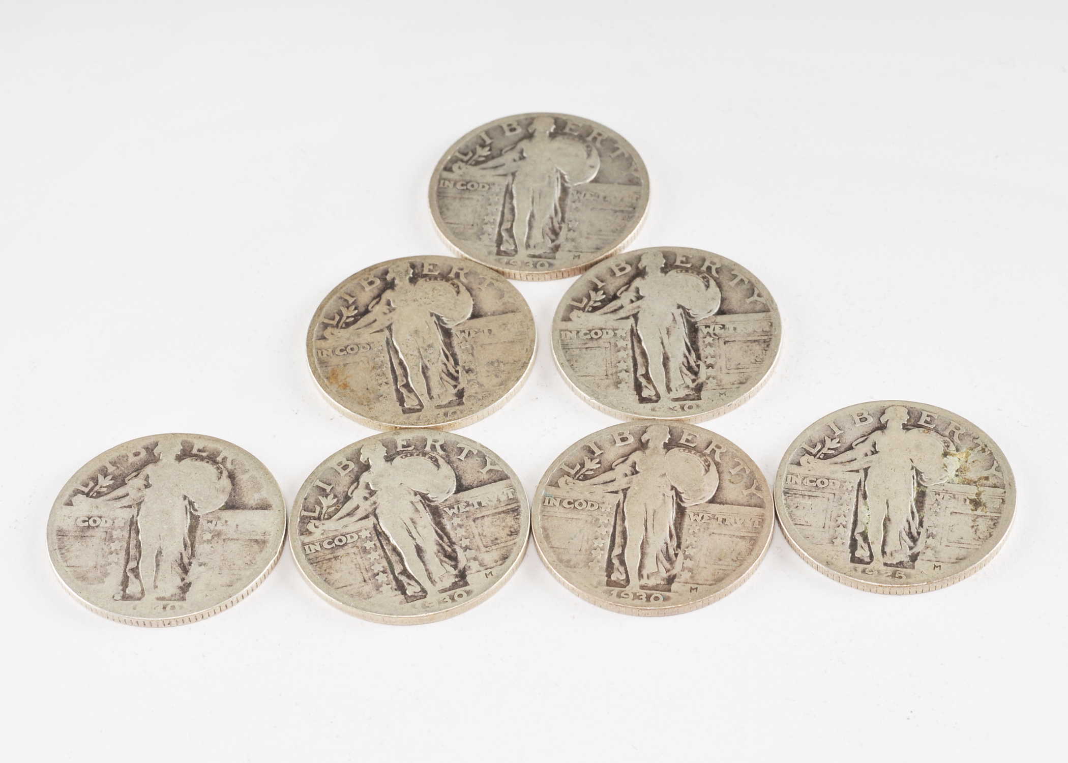 Group of (7) silver Standing Liberty quarters including the following: 1925, (5) 1930, and 1930 S