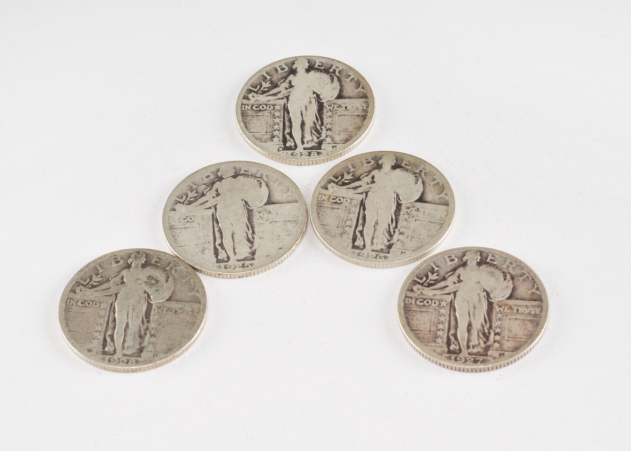 Group of (5) silver Standing Liberty quarters including the following: 1925, 1926, 1927, 1928 D, and 1928 S