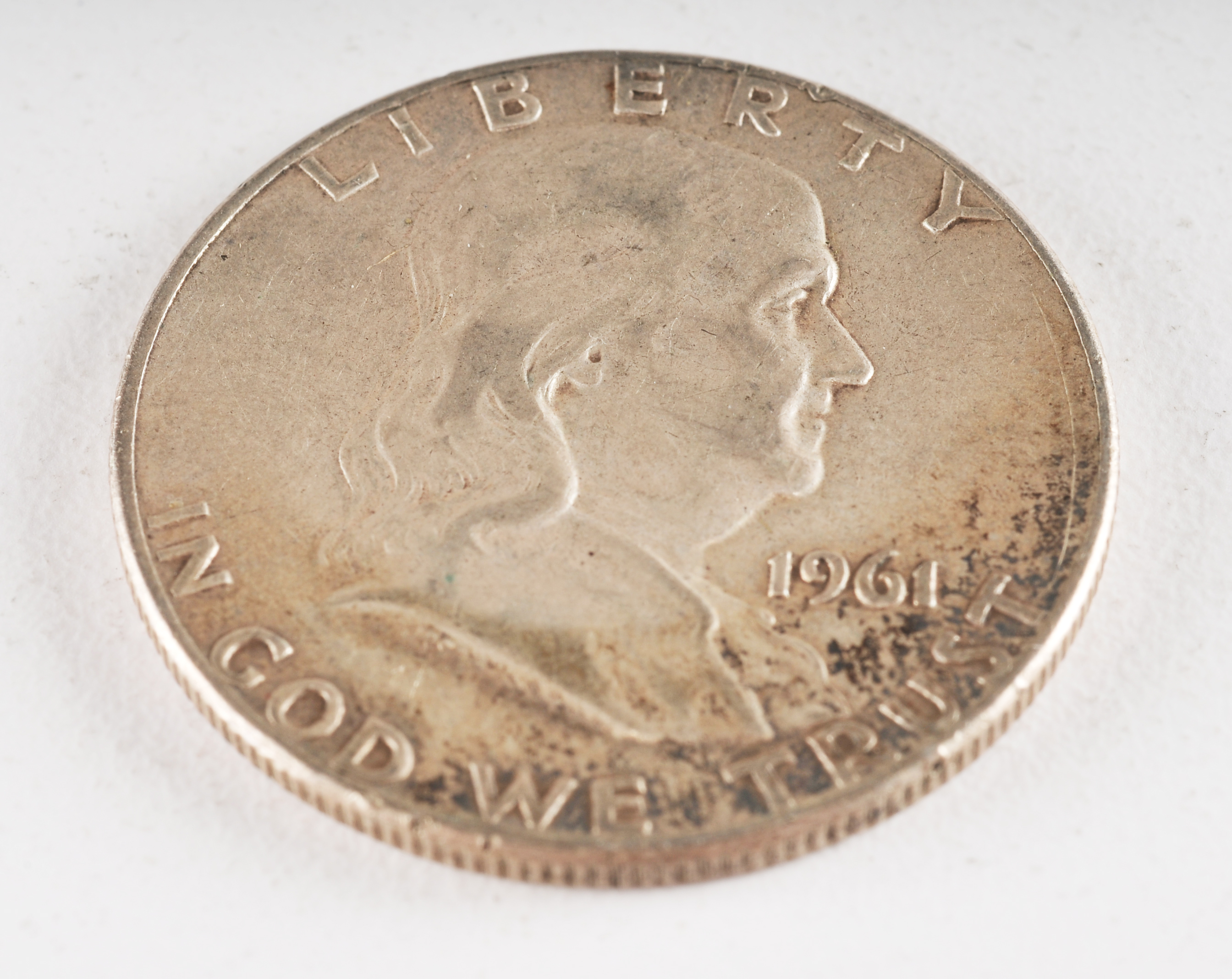 Group of (4) Franklin silver half dollars including the following: (1) 1961, (1) 1961 D, (1) 1962 D, and (1) 1963 D