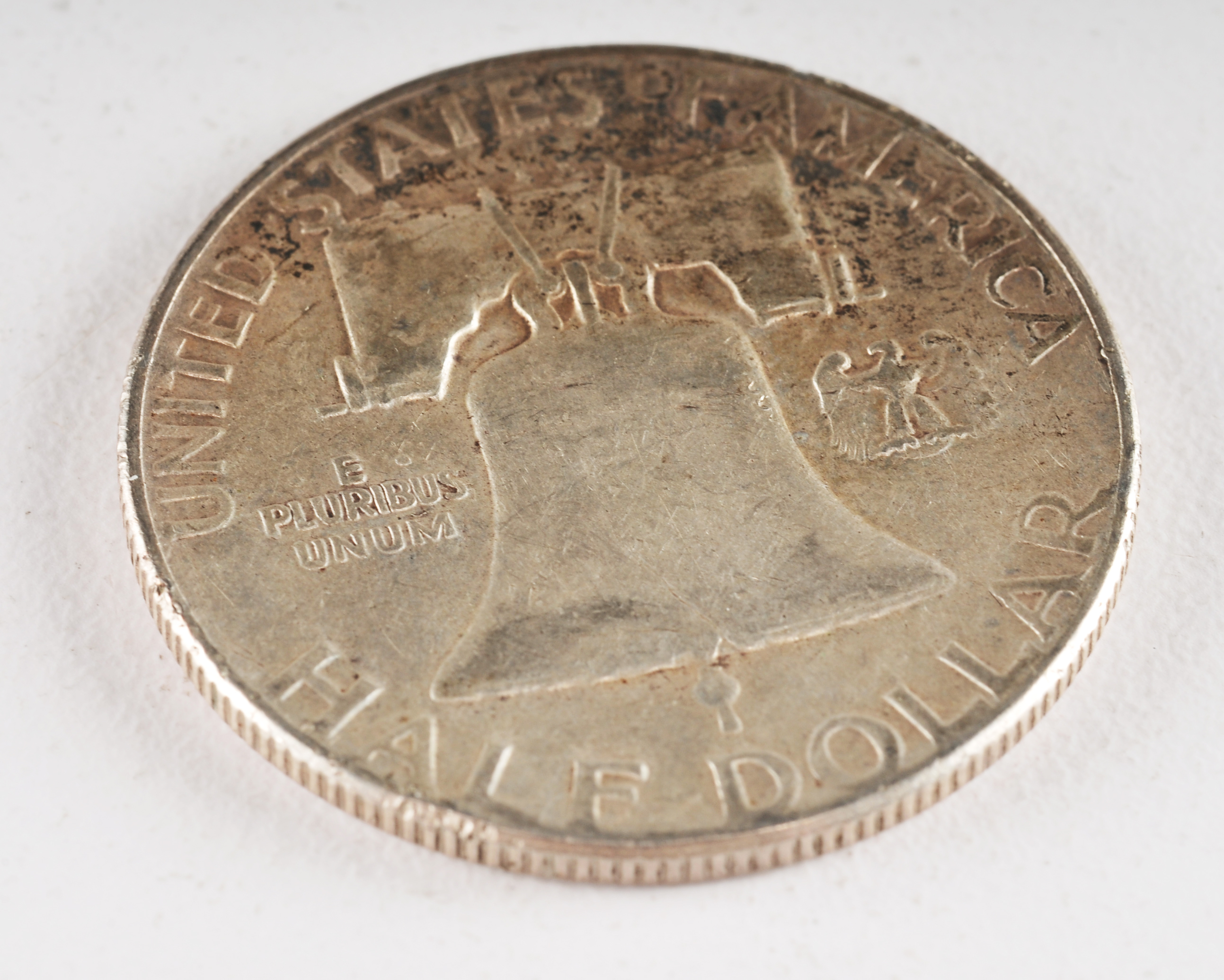 Group of (4) Franklin silver half dollars including the following: (1) 1961, (1) 1961 D, (1) 1962 D, and (1) 1963 D