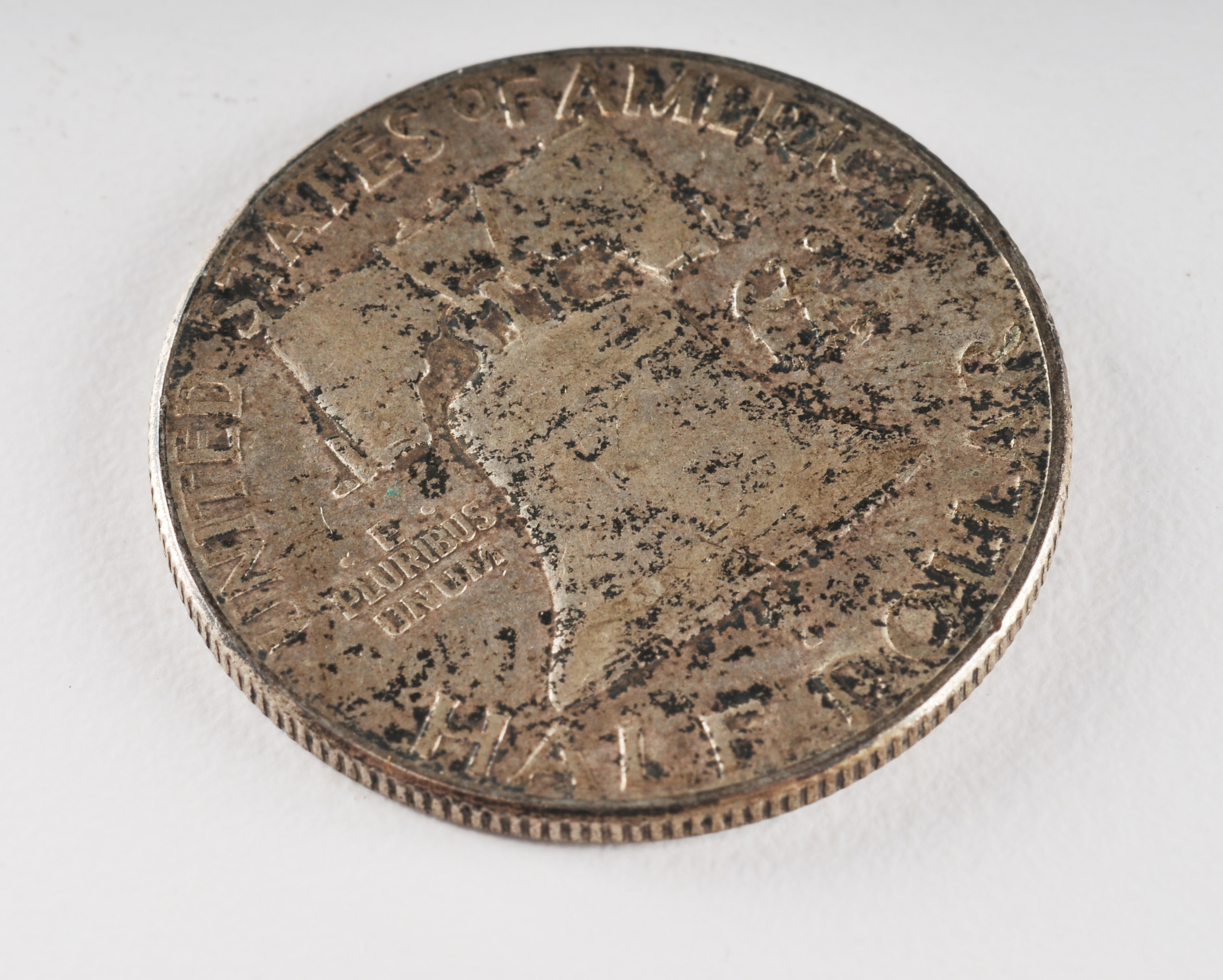 Group of (4) Franklin silver half dollars including the following: (2) 1949 S, and (2) 1950