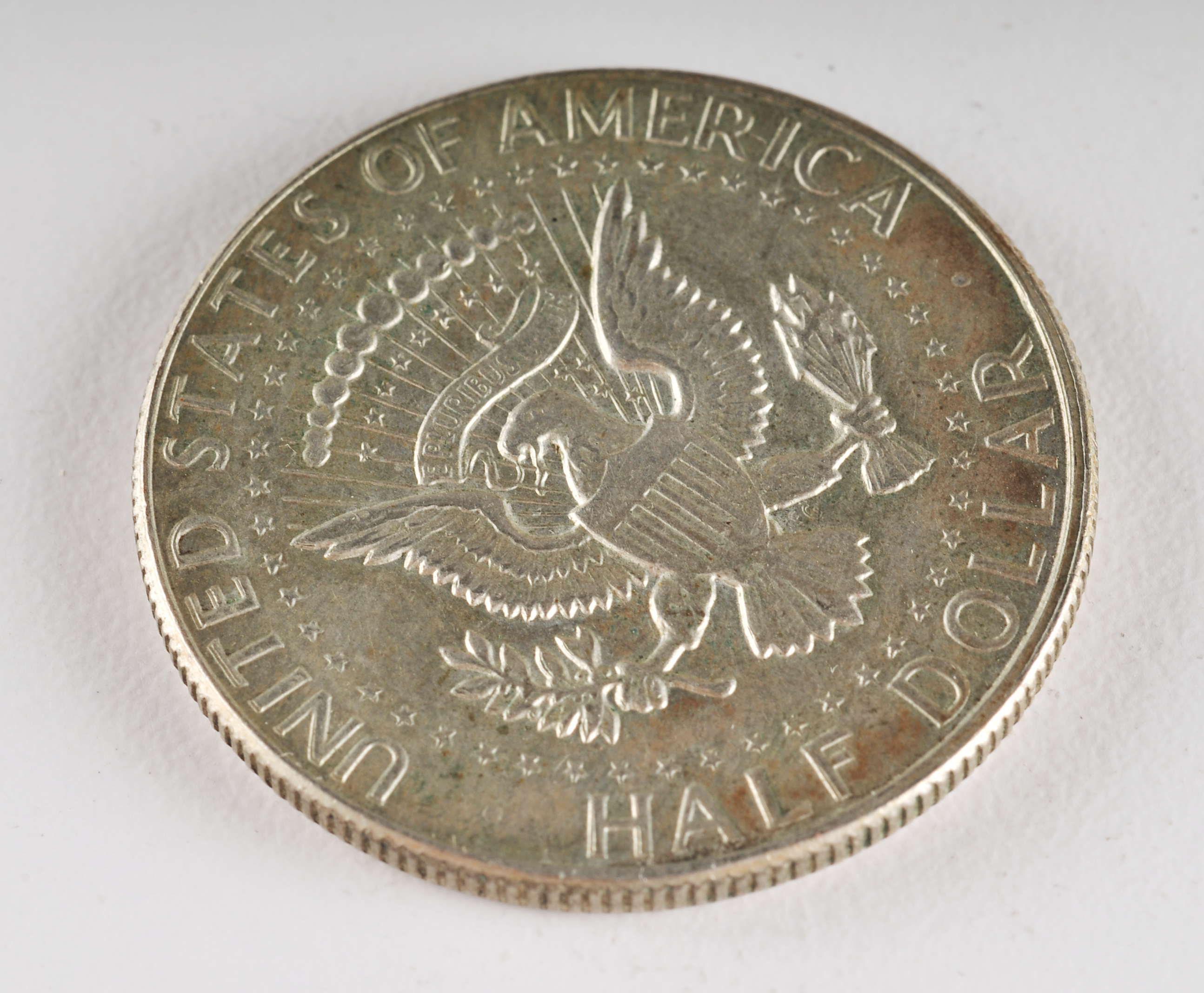 Group of (10) JFK silver clad half dollars including the following: (1) 1967, and (9) 1968 D