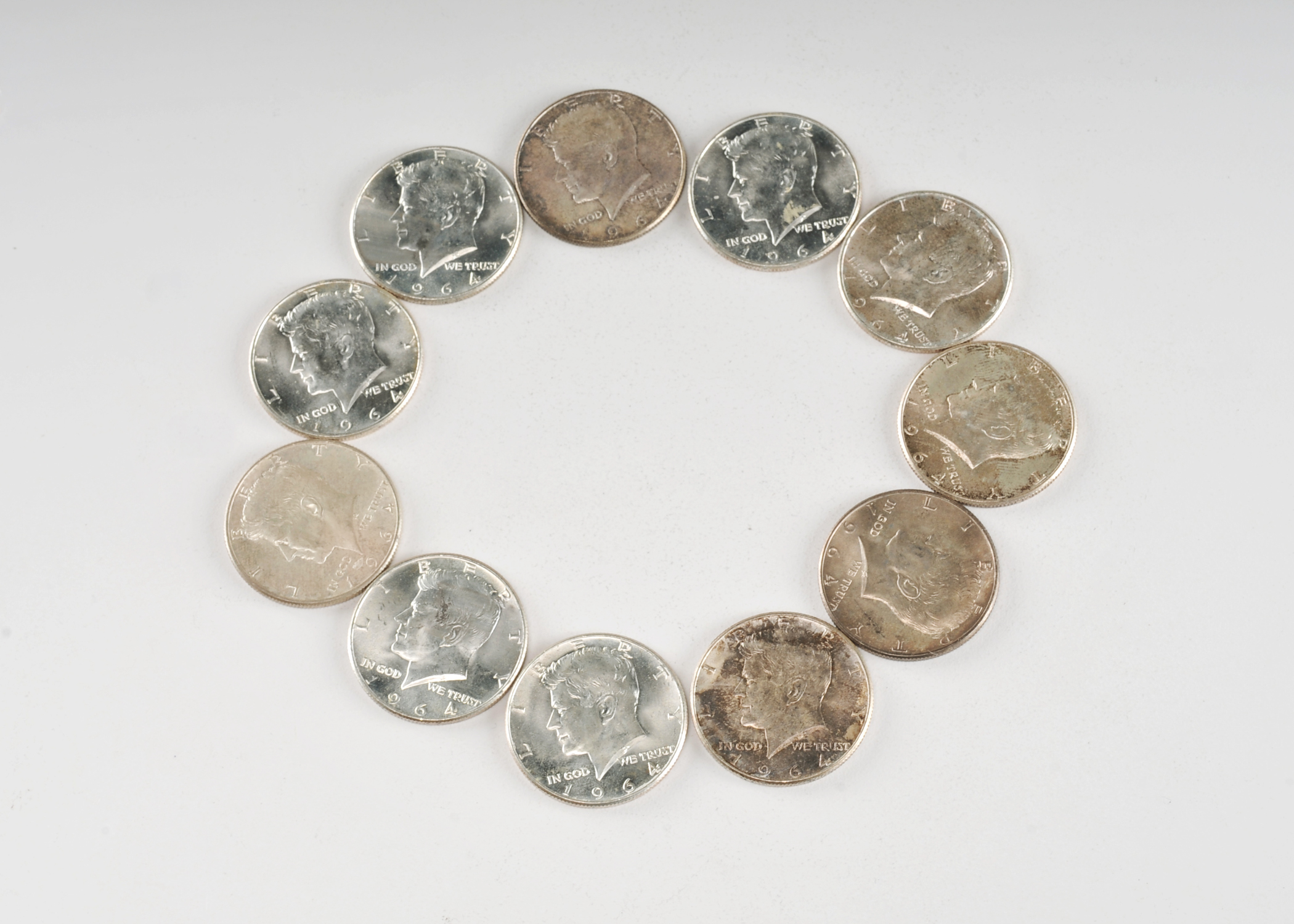 Group of (11) 1964 JFK silver half dollars