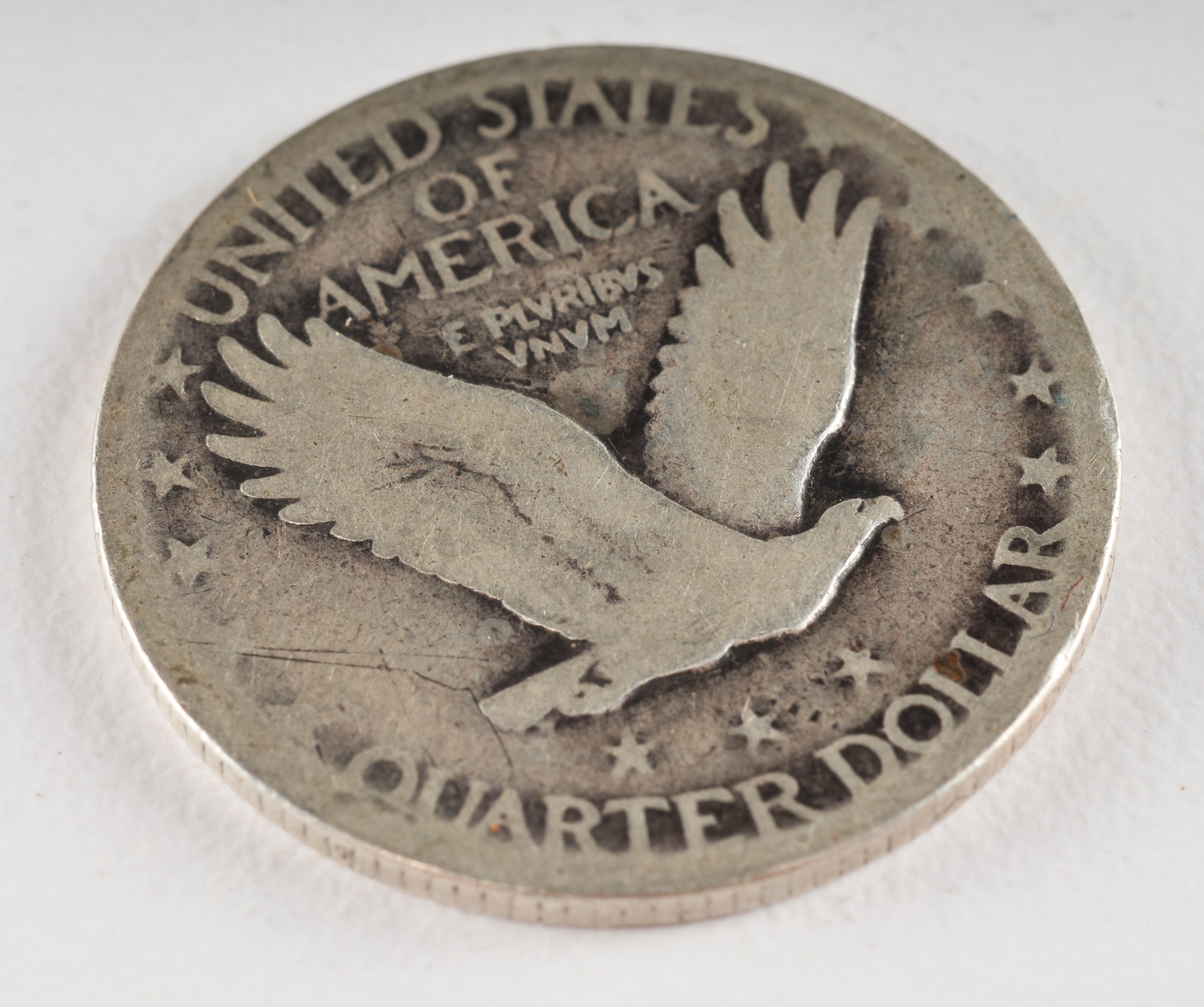 Group of (5) silver Standing Liberty quarters with unreadable dates