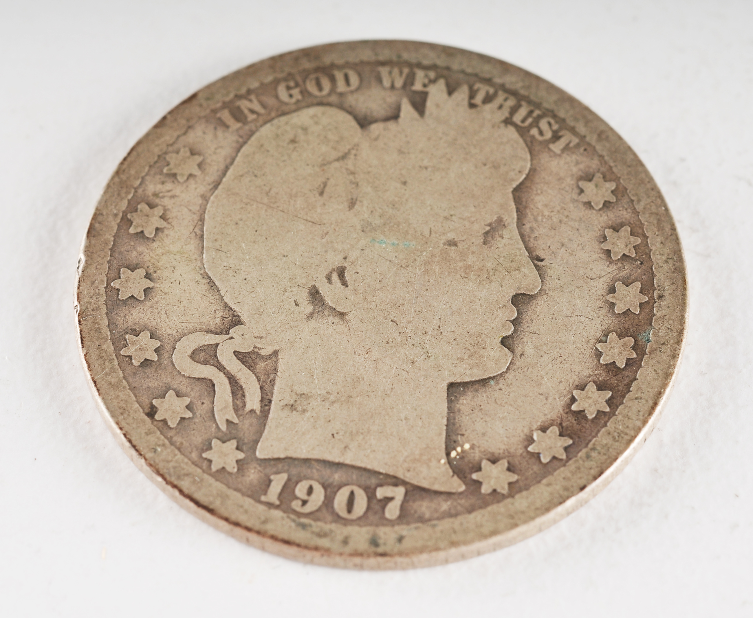 Group of (5) silver Barber quarters including the following: 1907, 1912, 1912 S, 1914, and 1914 D