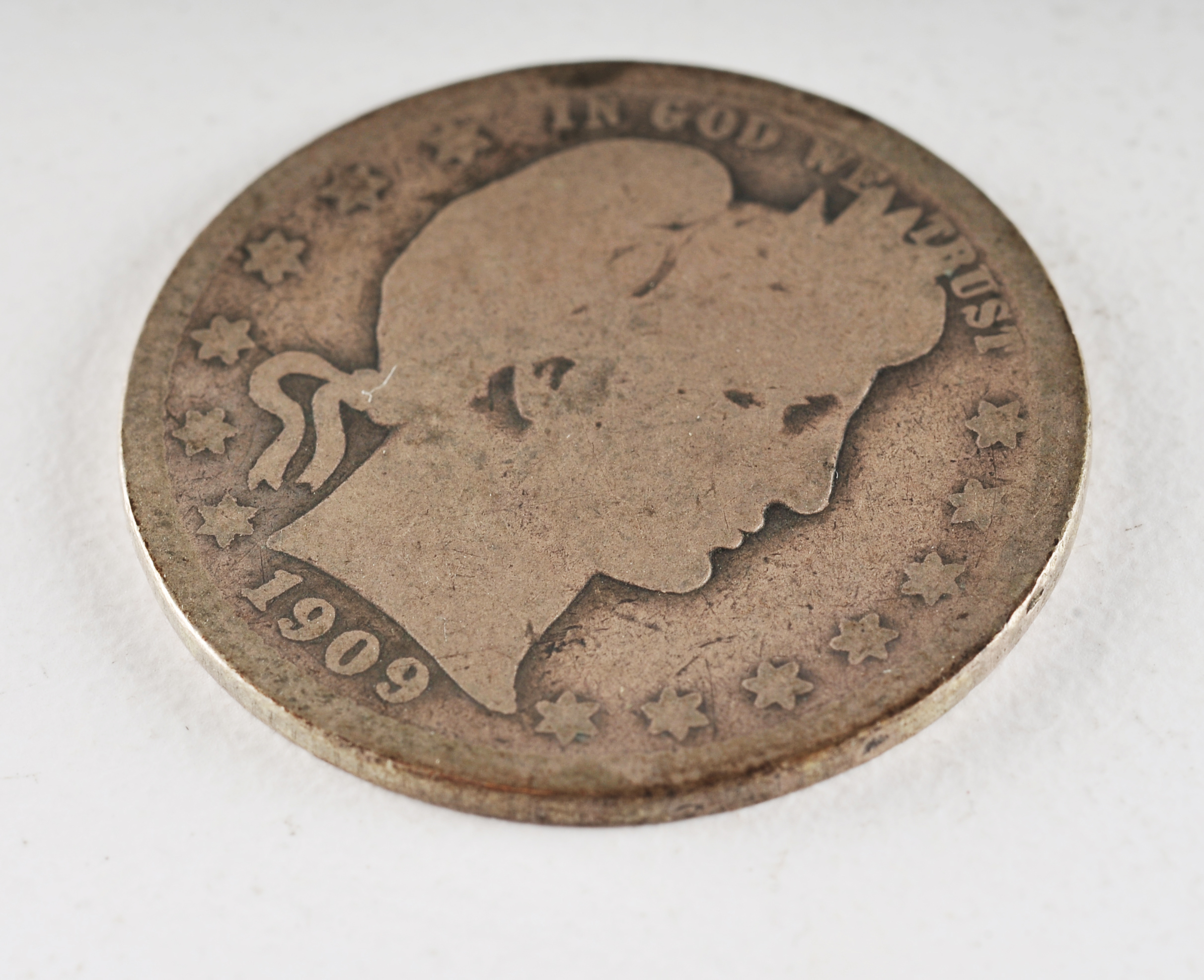 Group of (5) silver Barber quarters including the following: 1902, 1907, 1908 D, 1909, and 1909 D