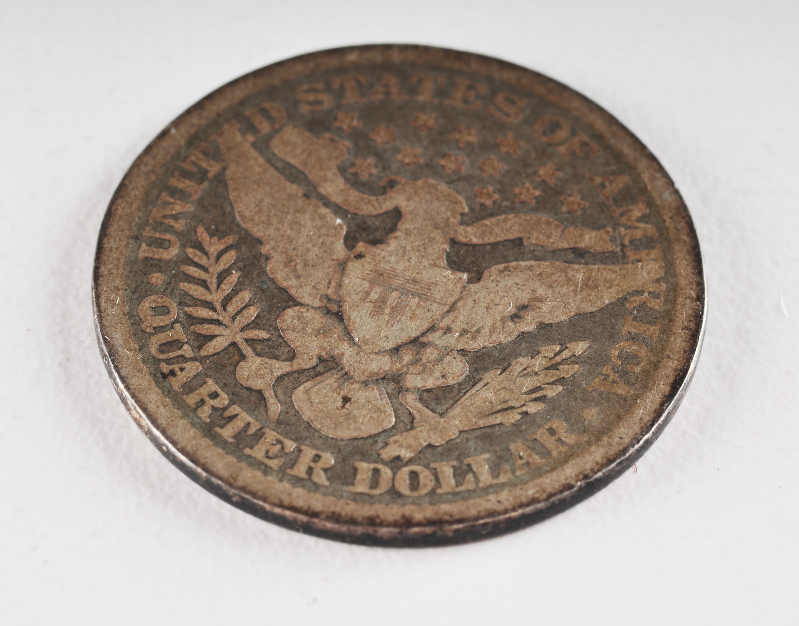 Group of (5) silver Barber quarters including the following: 1893, 1896, 1897, 1898, and 1899