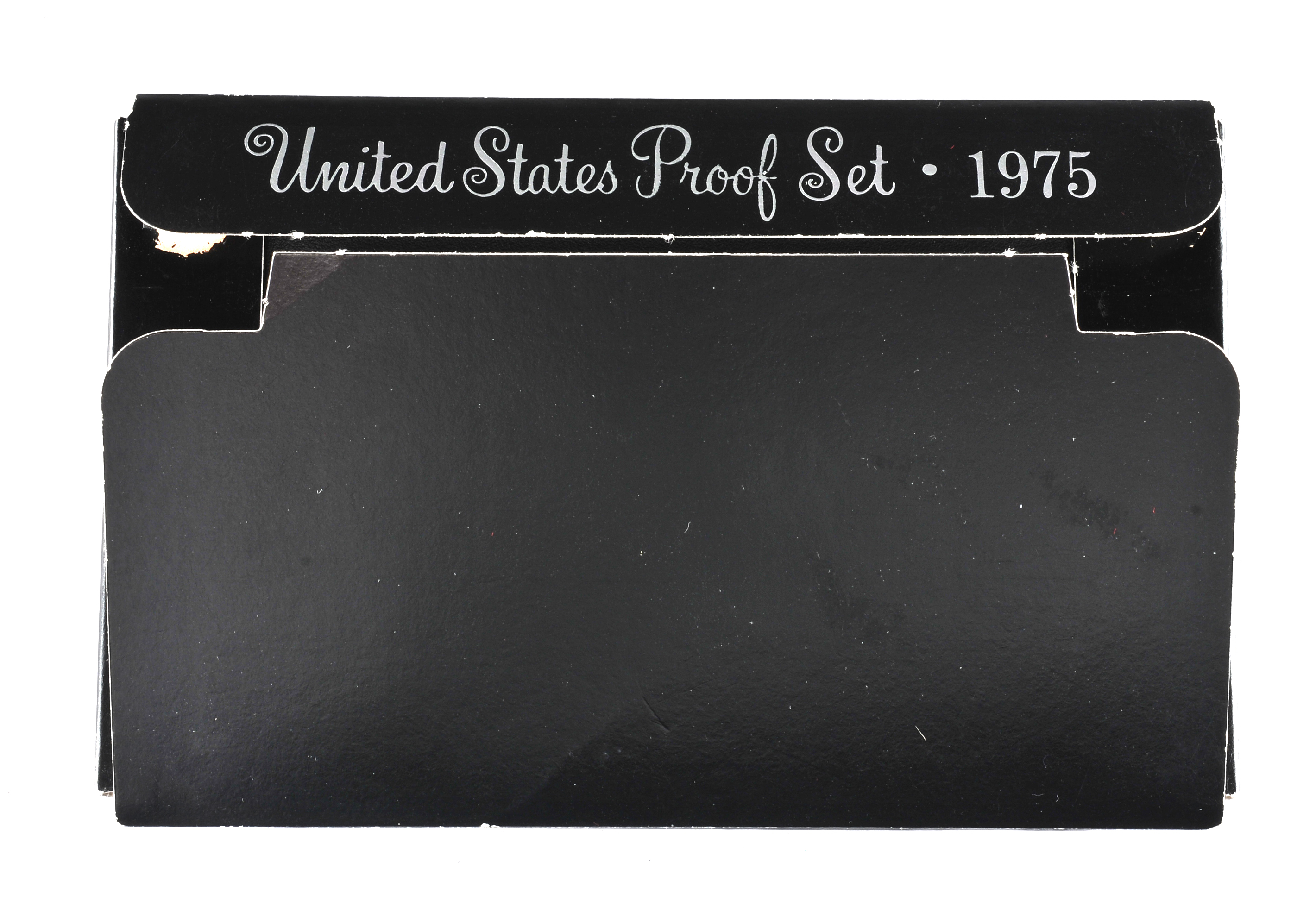 1975 U.S. Proof set including Eisenhower dollar, JFK half dollar, Washington quarter, Roosevelt dime, Jefferson nickel, and Lincoln penny