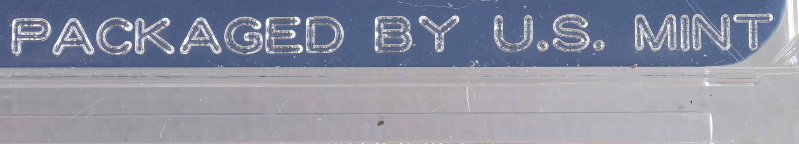 1966 United States special mint set including a JFK half dollar, Washington quarter, Roosevelt dime, Jefferson nickel, and Lincoln penny