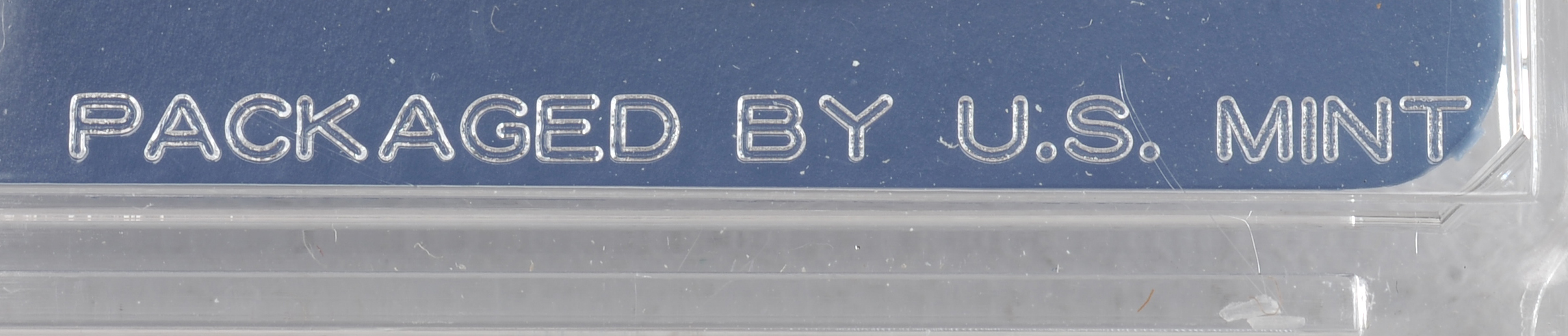 1966 United States special mint set including a JFK half dollar, Washington quarter, Roosevelt dime, Jefferson nickel, and Lincoln penny