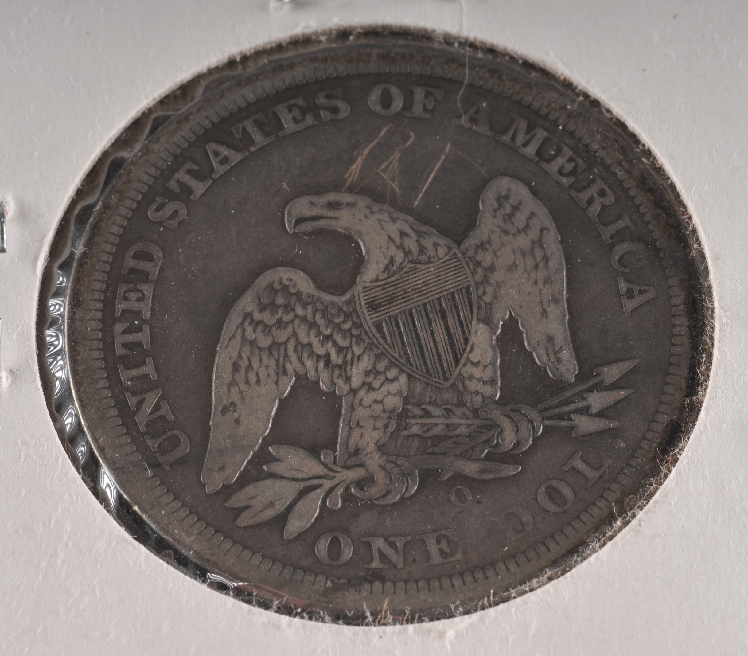 1860 O Liberty Seated silver dollar