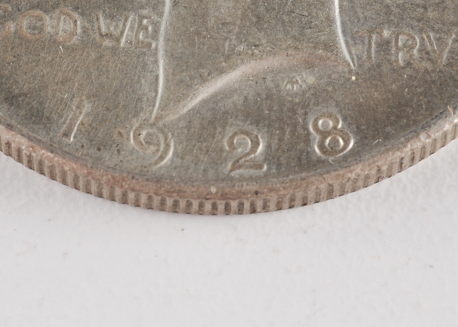Low mintage Key date 1928 Peace silver dollar