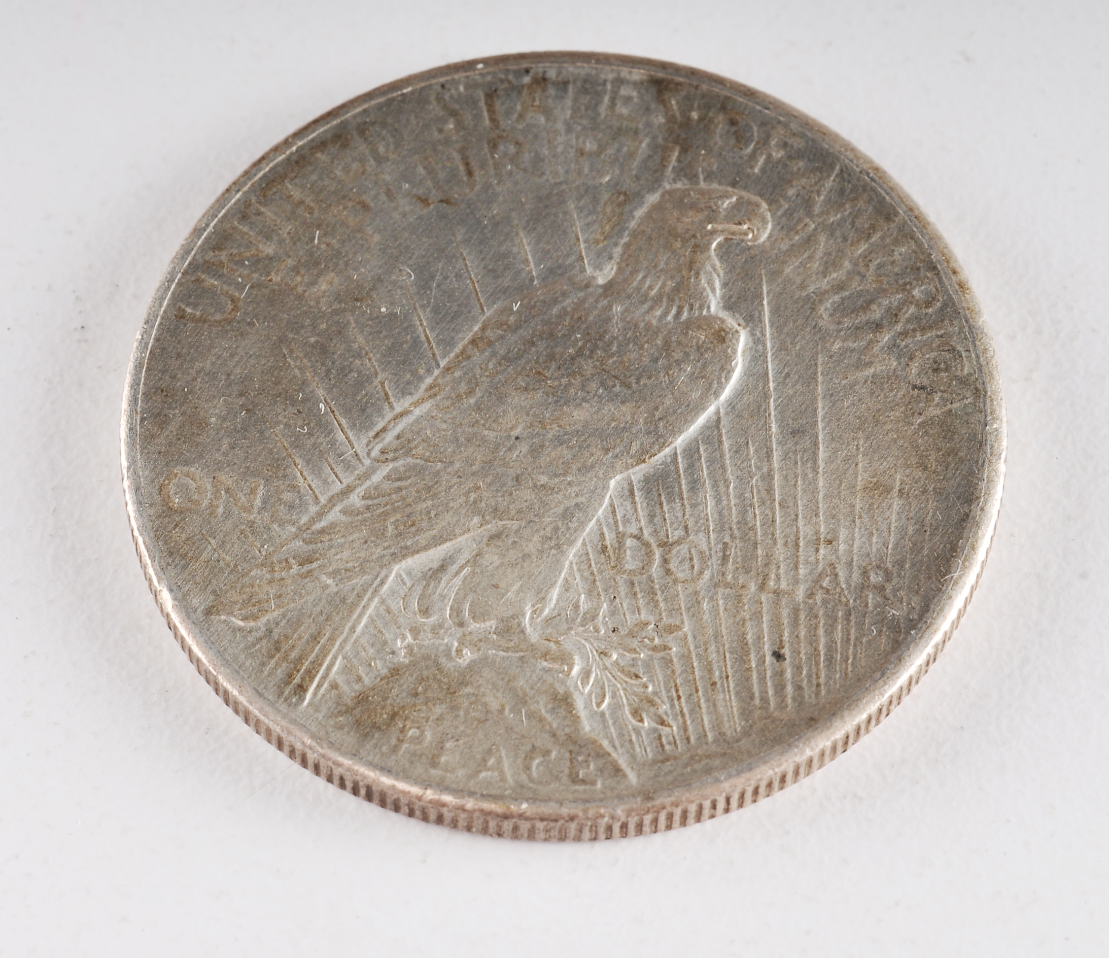 Low mintage Key date 1928 Peace silver dollar