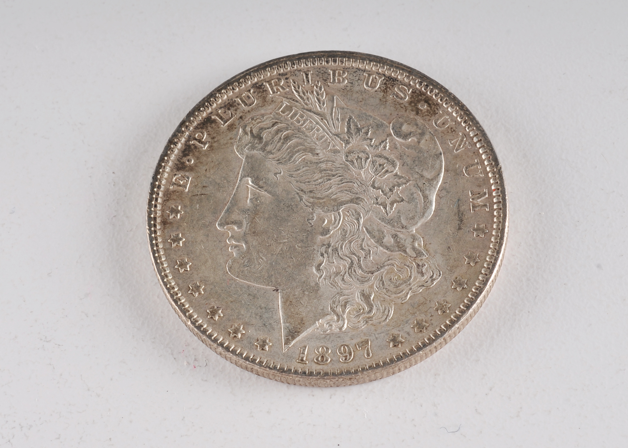1897 Morgan silver dollar