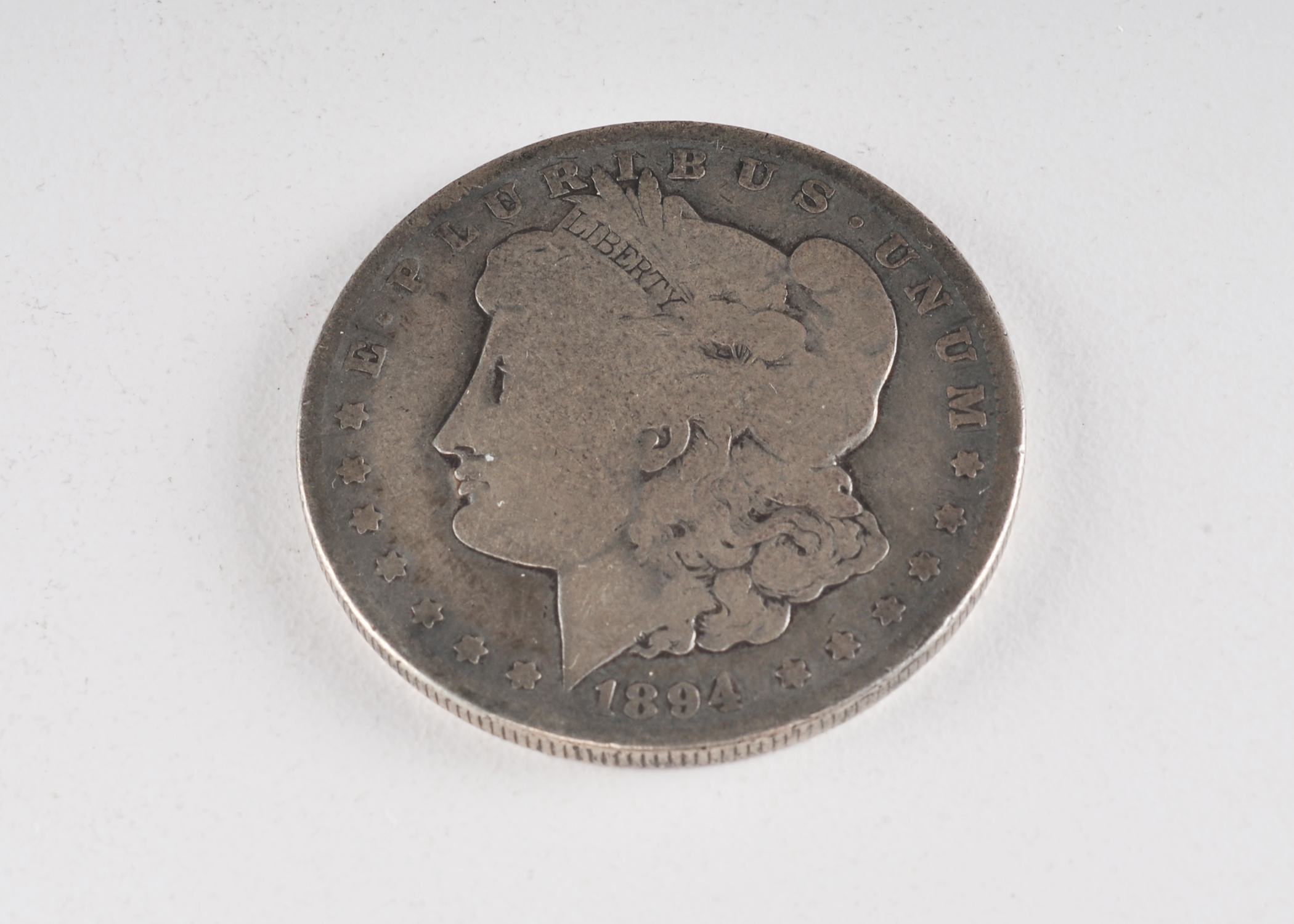 1894 O Morgan silver dollar