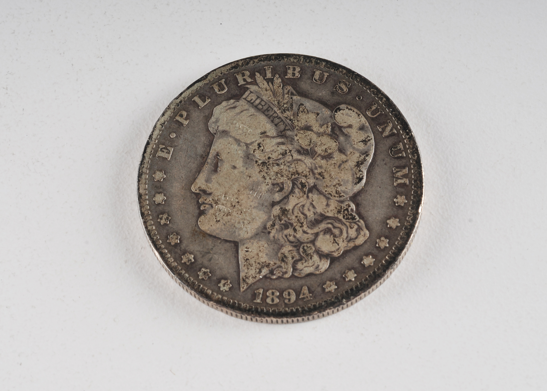 1894 O Morgan silver dollar