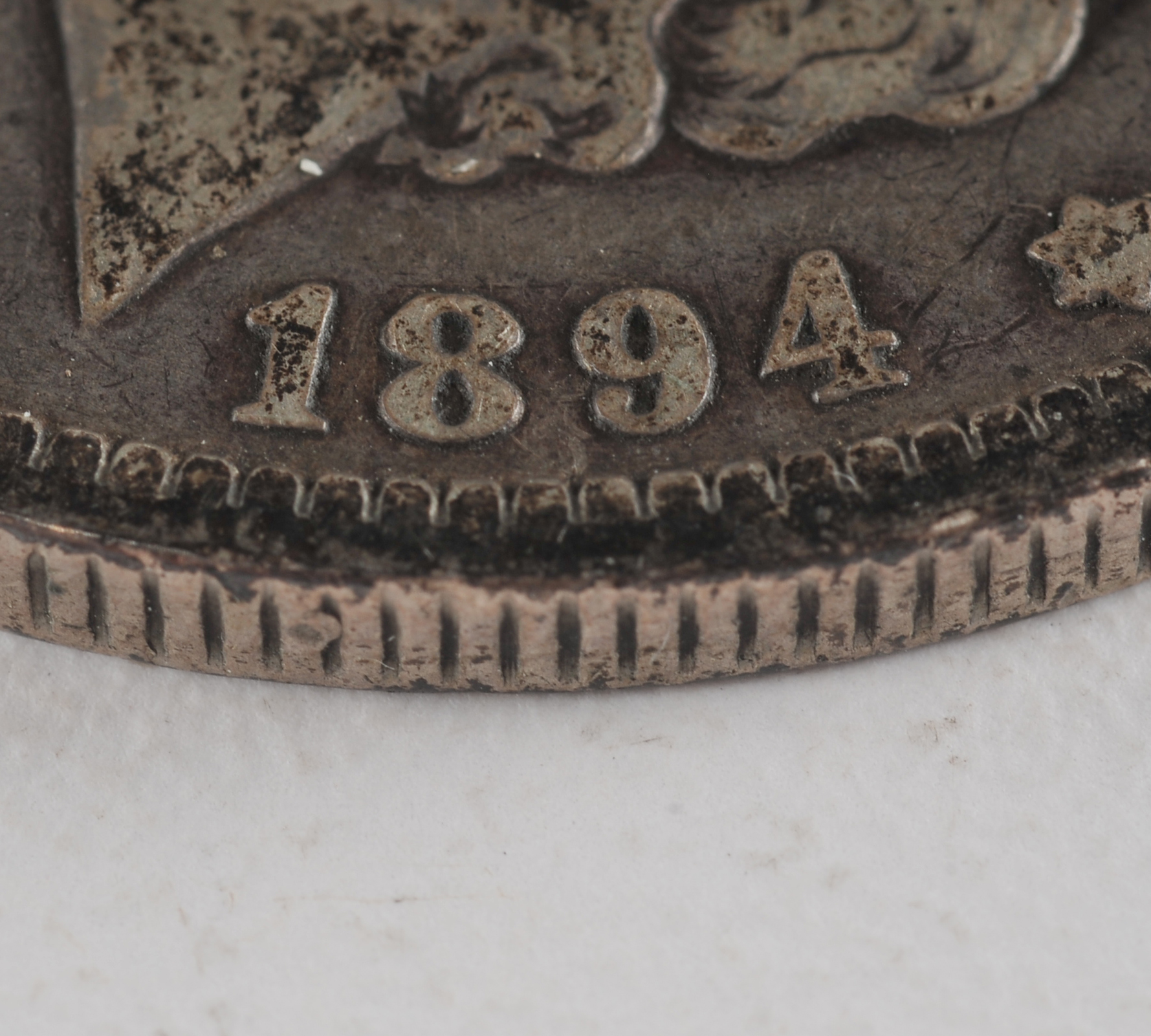 1894 O Morgan silver dollar