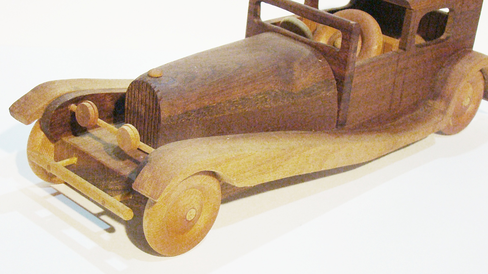 Plants n Planks vintage wooden car. 