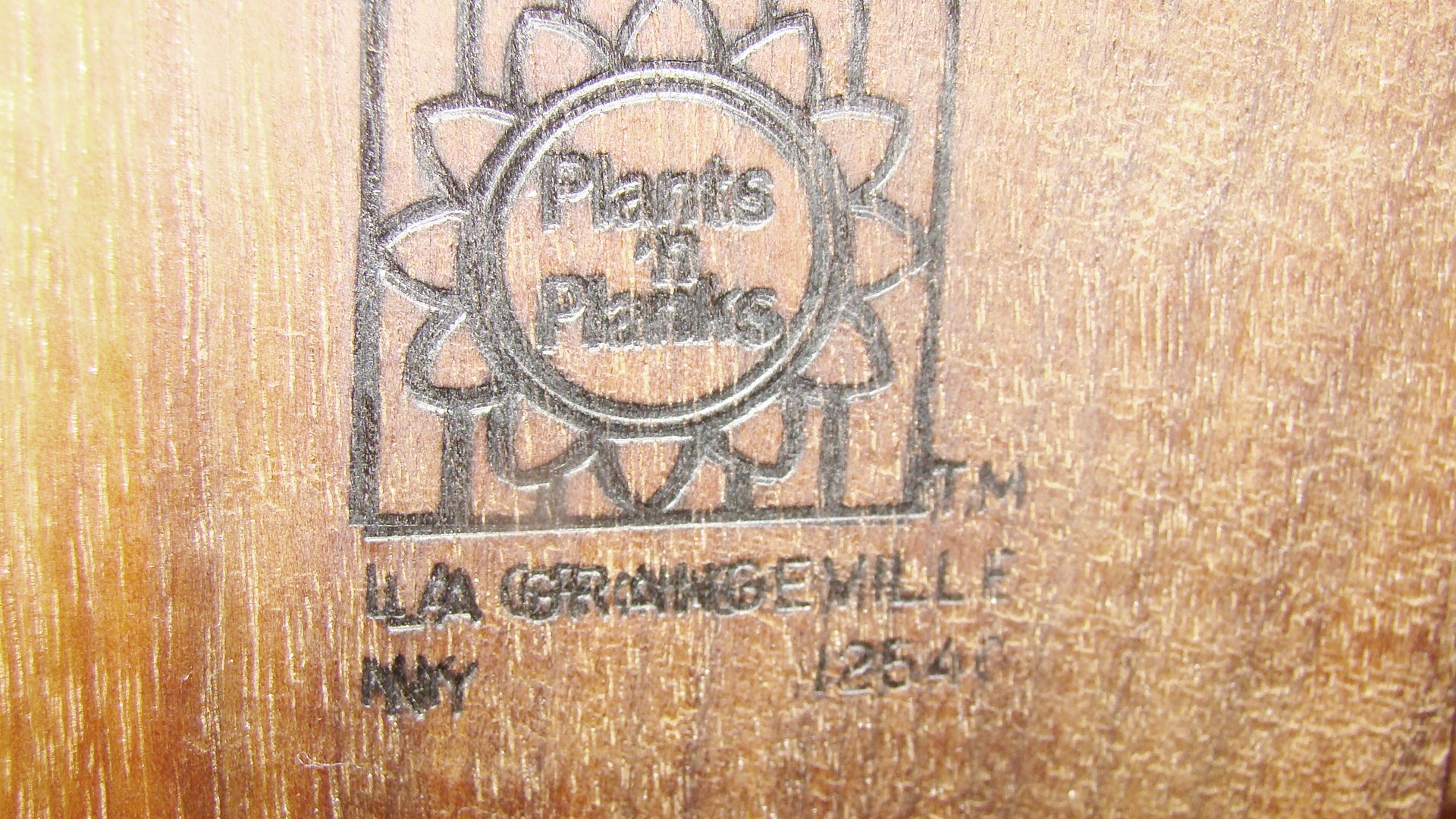 Plants n Planks vintage wooden car. 