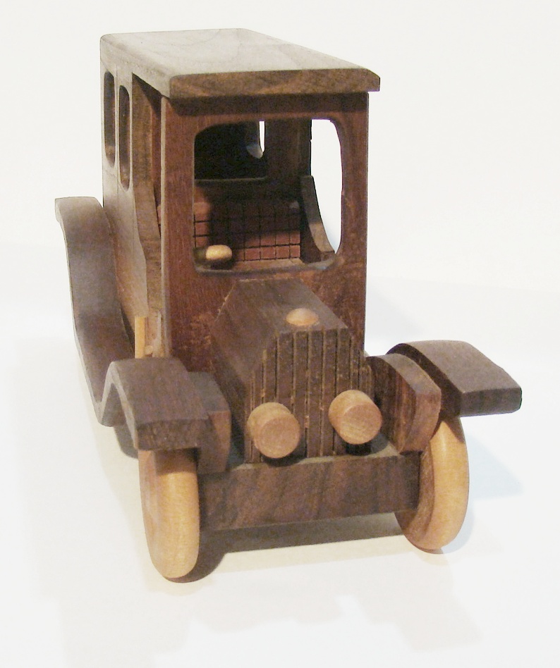 Plants n Planks vintage wooden car. 