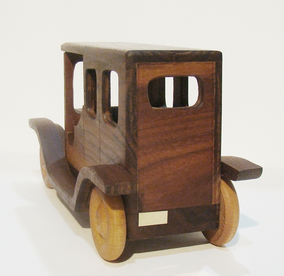 Plants n Planks vintage wooden car. 