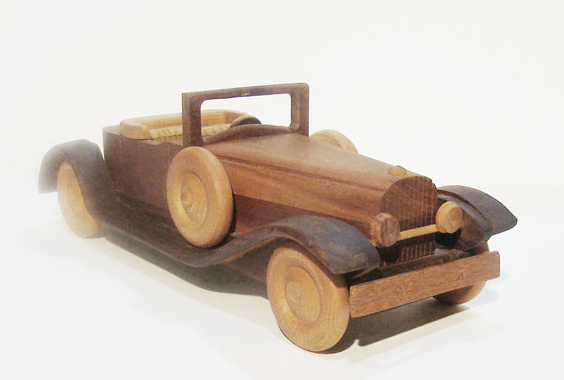 Plants n Planks vintage wooden car. 