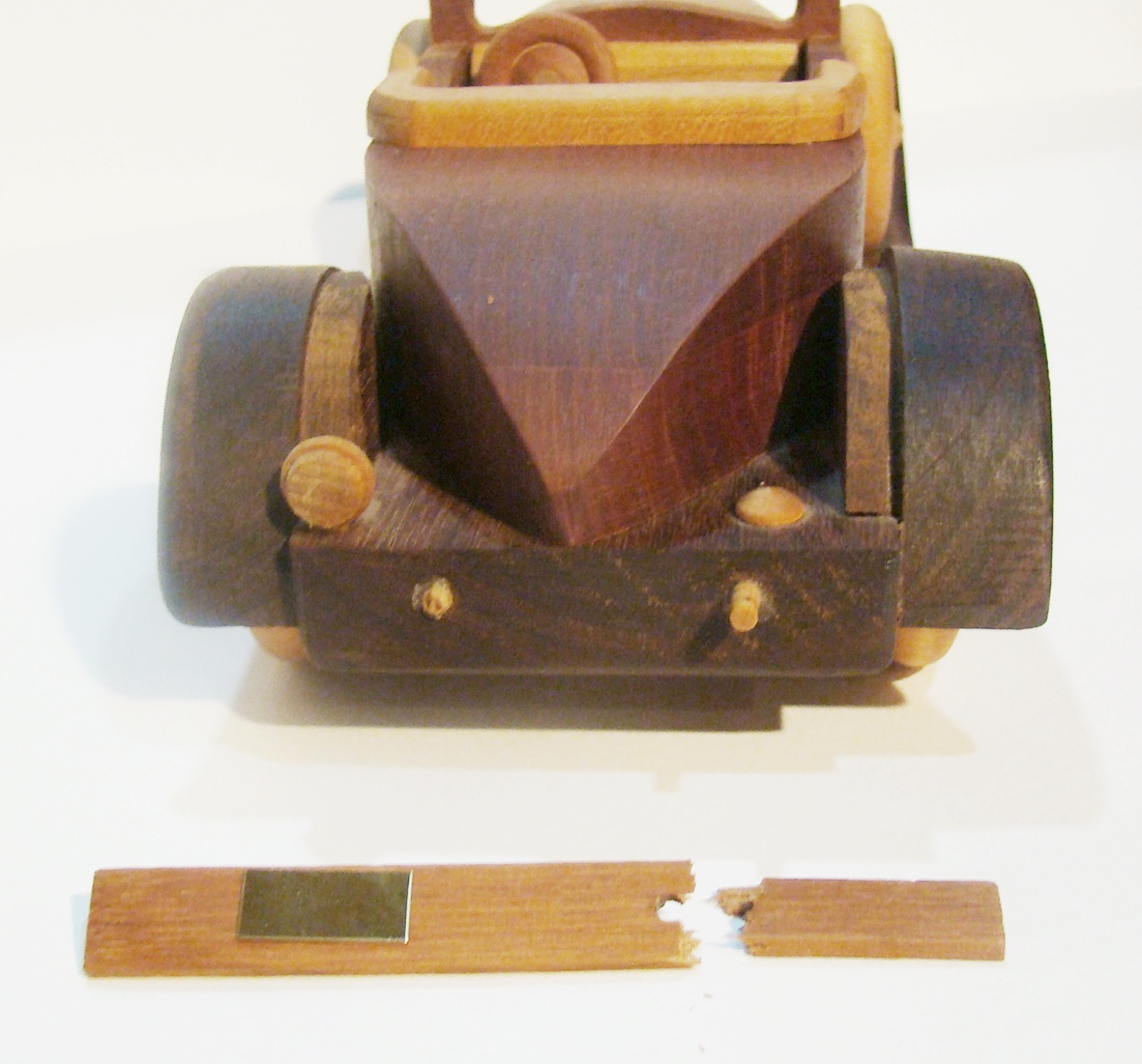 Plants n Planks vintage wooden car. 