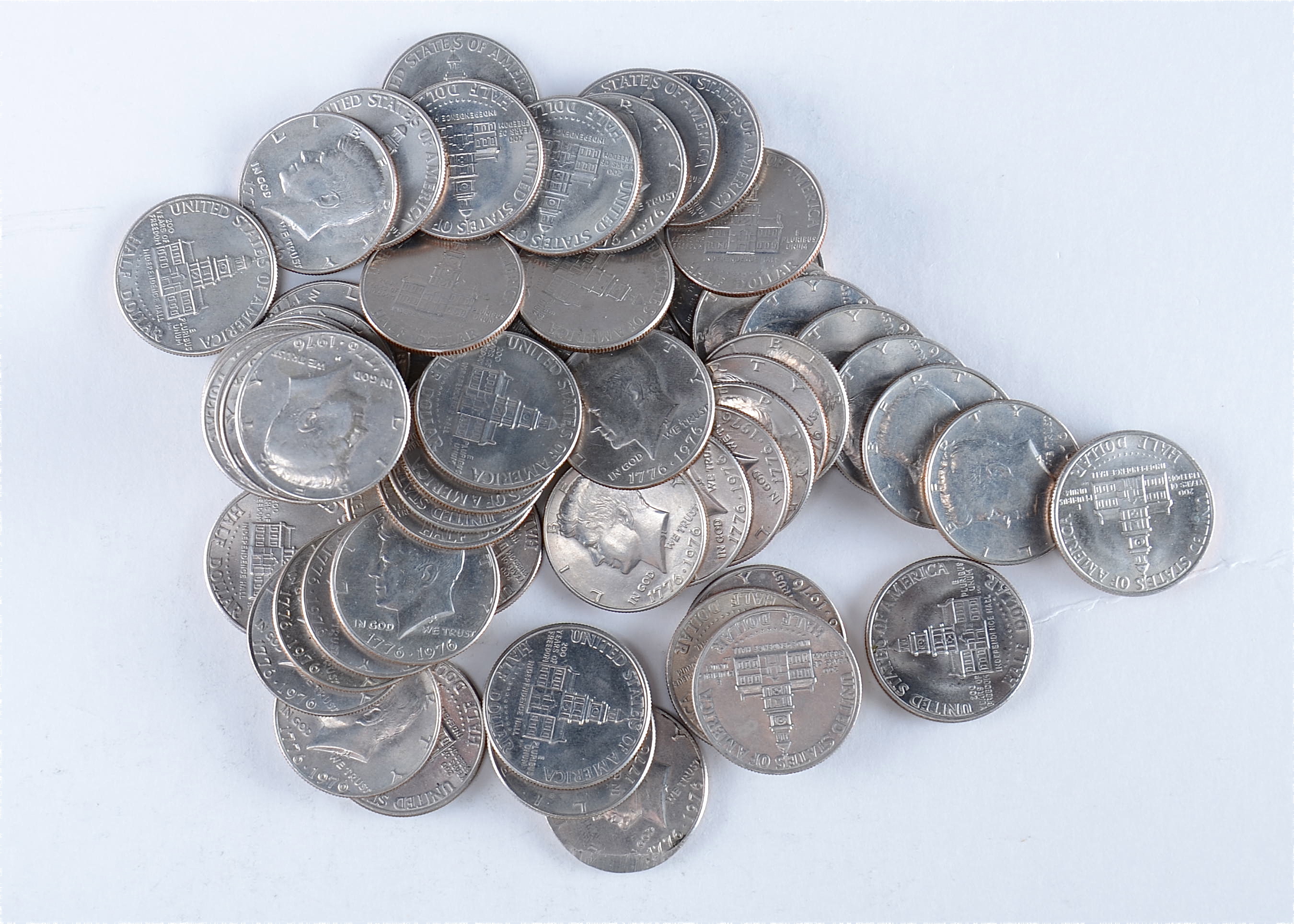 Group of (64) 1976 JFK Bicentennial Half dollars including the following: (47) from the Philadelphia mint and (17) from the Denver mint