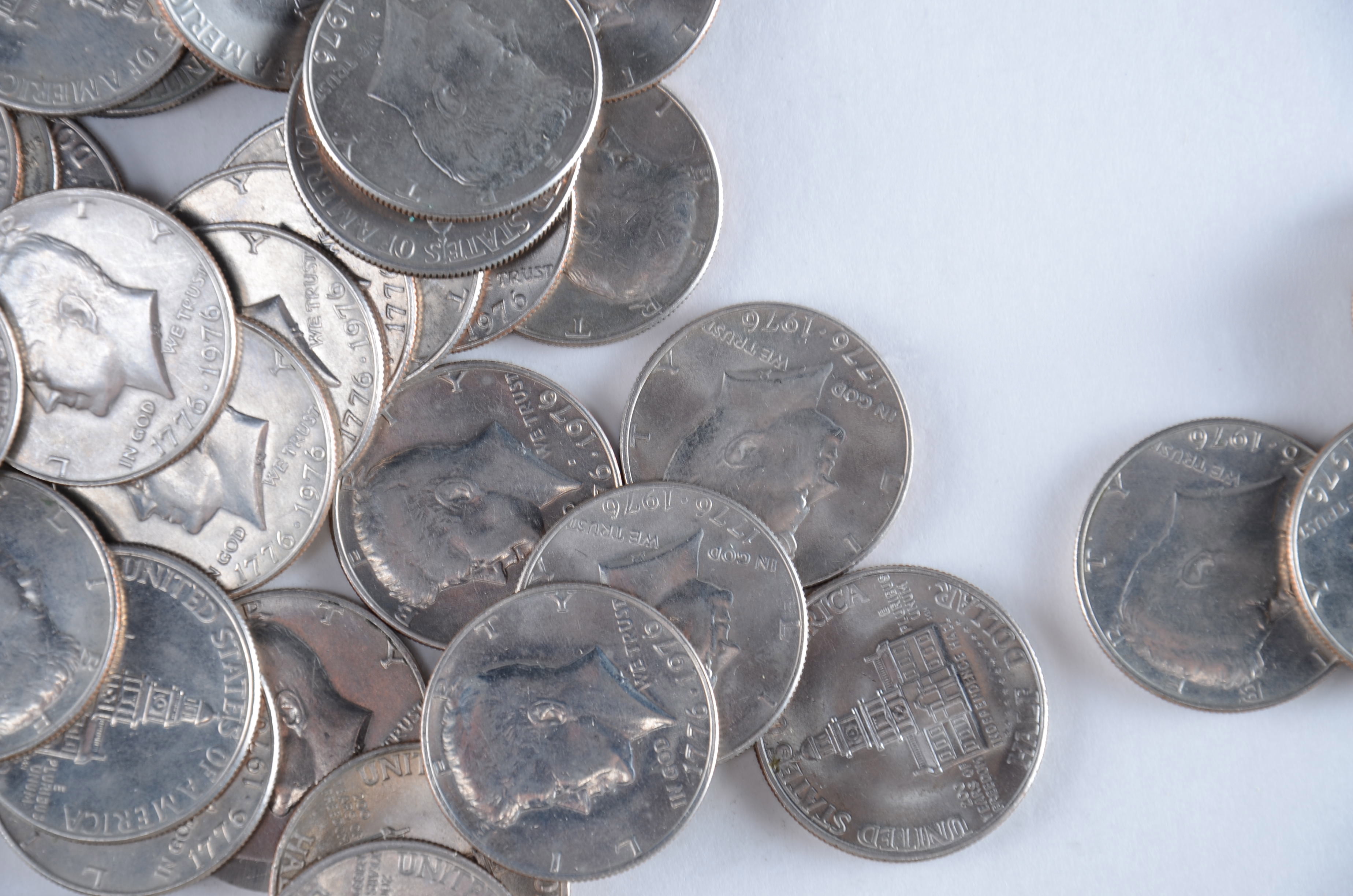 Group of (64) 1976 JFK Bicentennial Half dollars including the following: (47) from the Philadelphia mint and (17) from the Denver mint